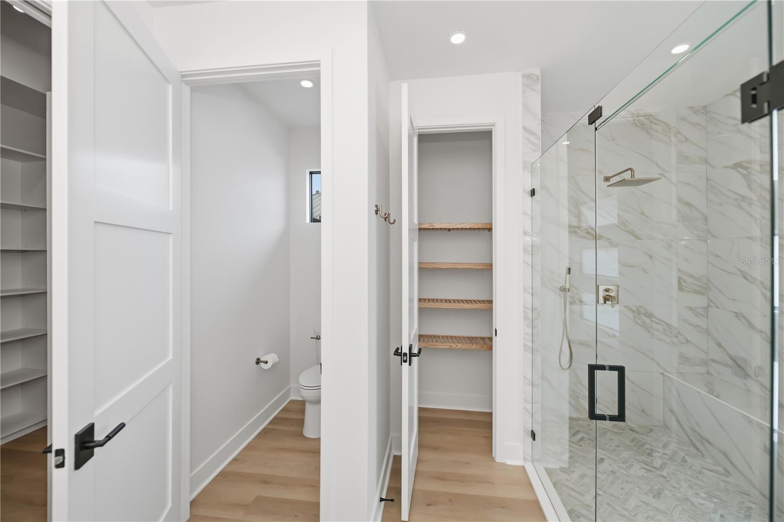 Walk-In Shower and Custom Storage. - 16692 LIGGETT CIR, PORT CHARLOTTE