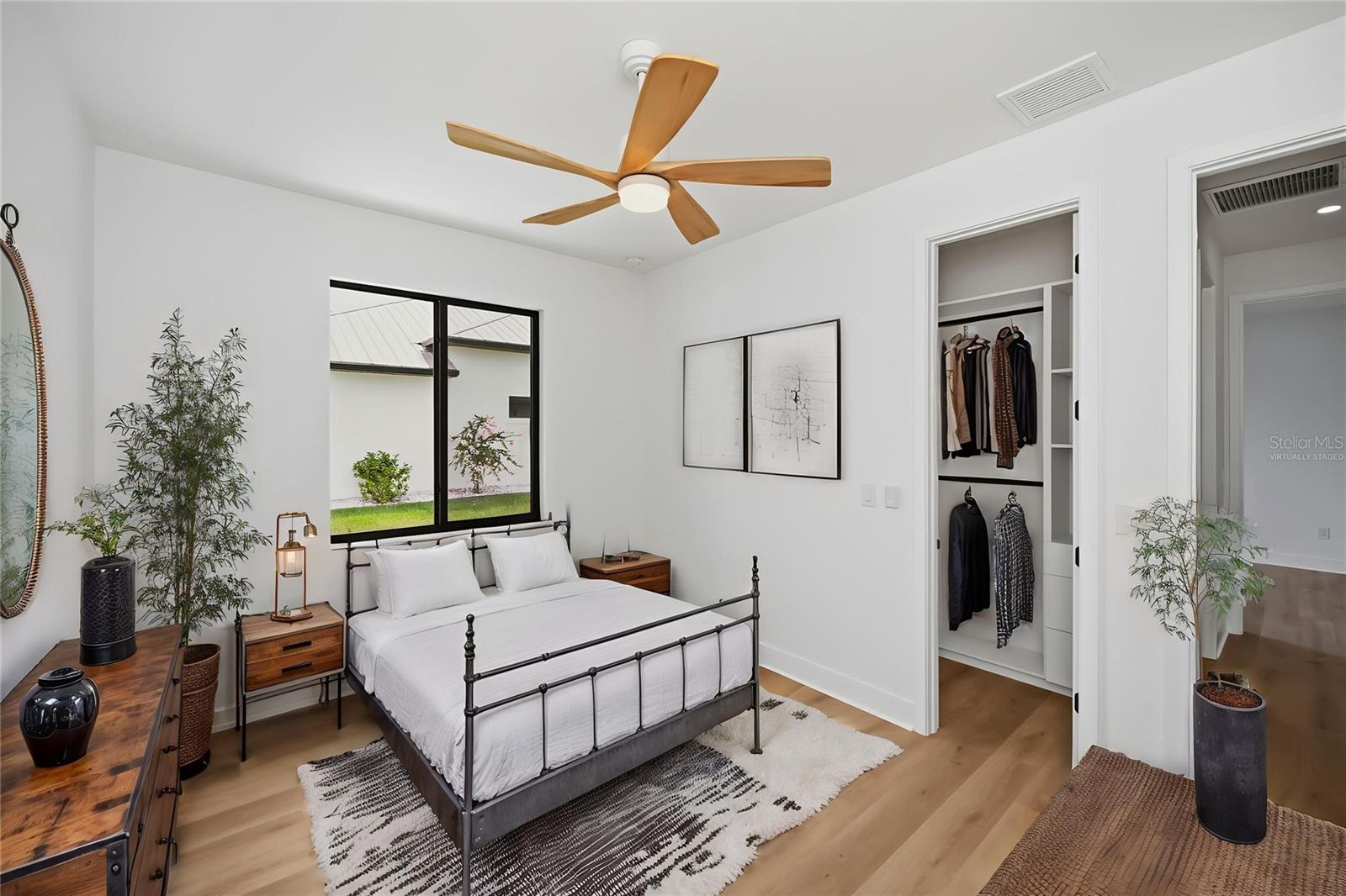 Virtually Staged Bedroom 2 with Walk-In Closet. - 16692 LIGGETT CIR, PORT CHARLOTTE