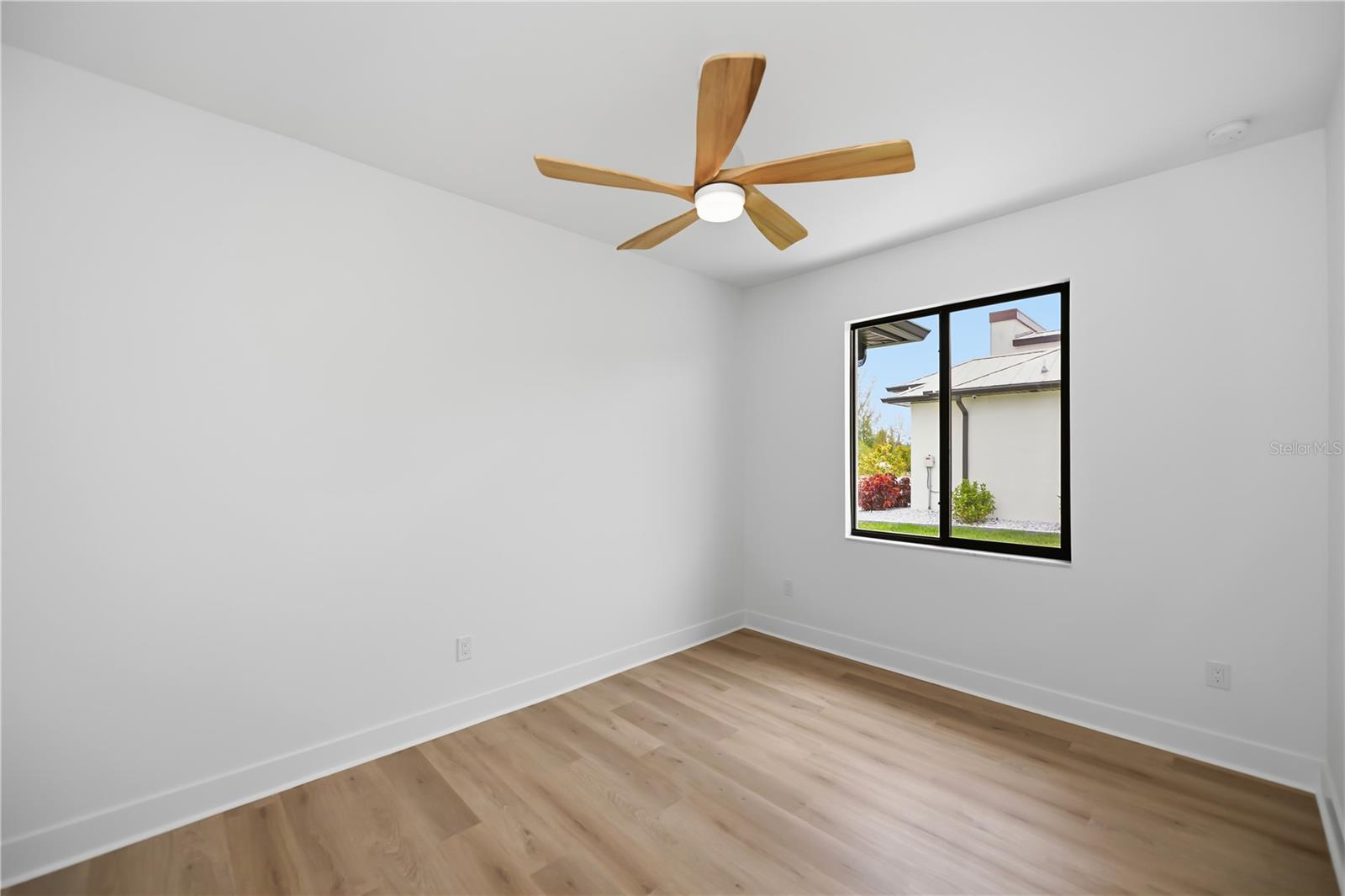 Bedroom 2 Showcasing Modern Design. - 16692 LIGGETT CIR, PORT CHARLOTTE