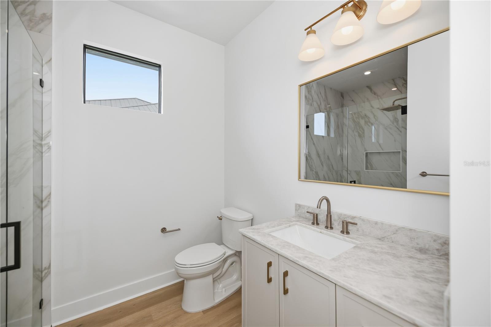 Bathroom 2 with Walk-In Shower and Designer Finishes. - 16692 LIGGETT CIR, PORT CHARLOTTE