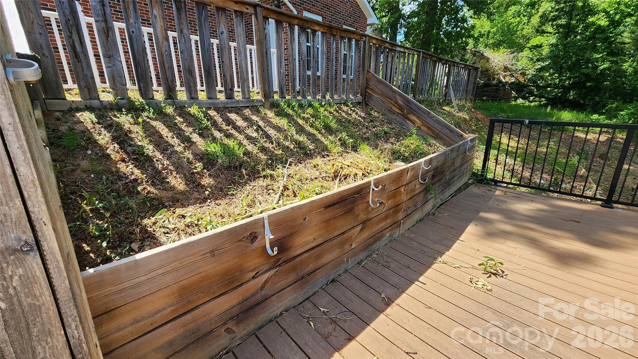 Planter, fence, deck at pool area - 200 Park Place, Morganton