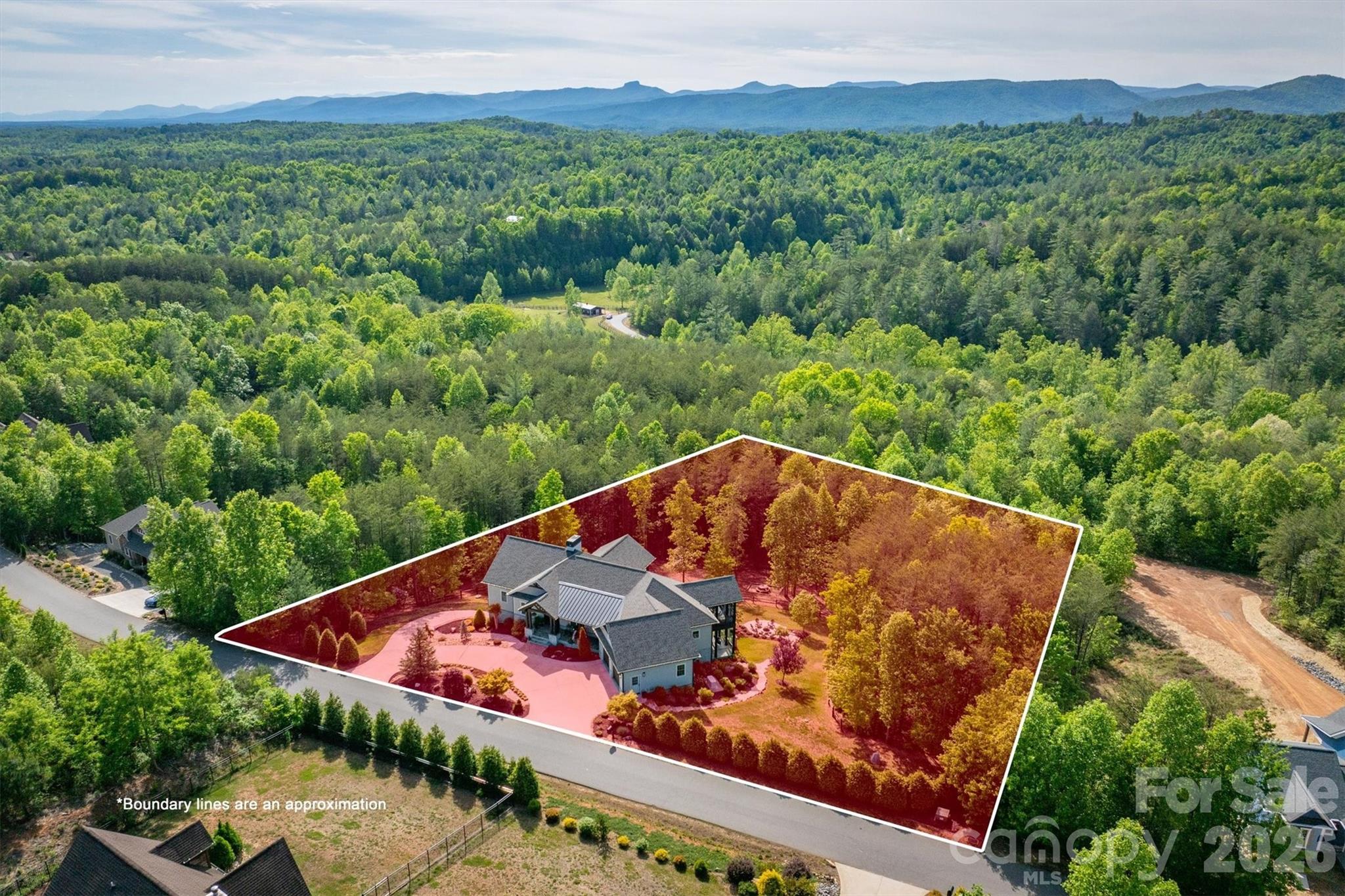 The homes is located in the 3,200 acre gated community, The Coves Mountain River Club - 1506 High Valley Way, Lenoir