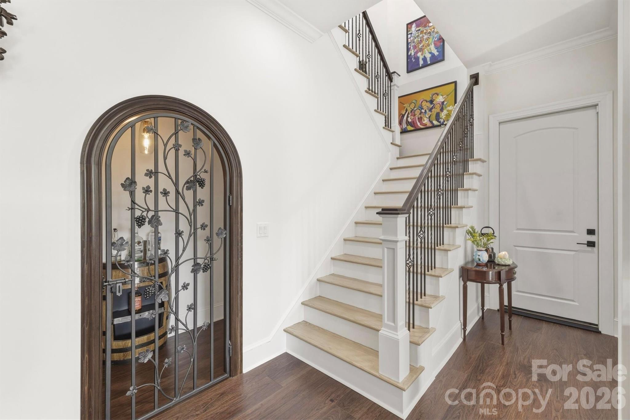 Wine Cellar with artisan, hand-crafted, Charlotte Grapevine arched metal door - 1506 High Valley Way, Lenoir