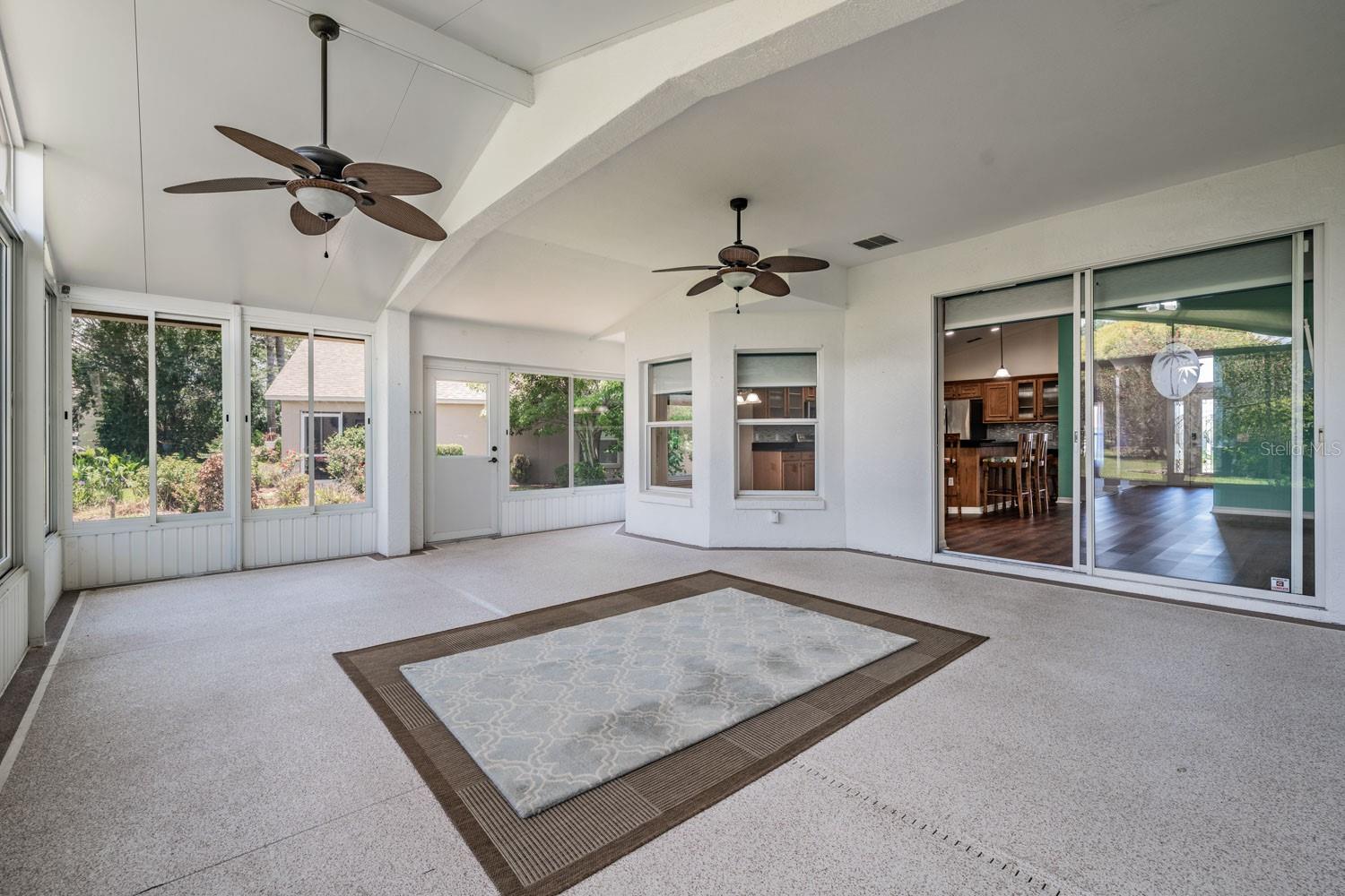 16x24 enclosed air conditioned Florida room - 11709 SPINDRIFT LOOP, HUDSON
