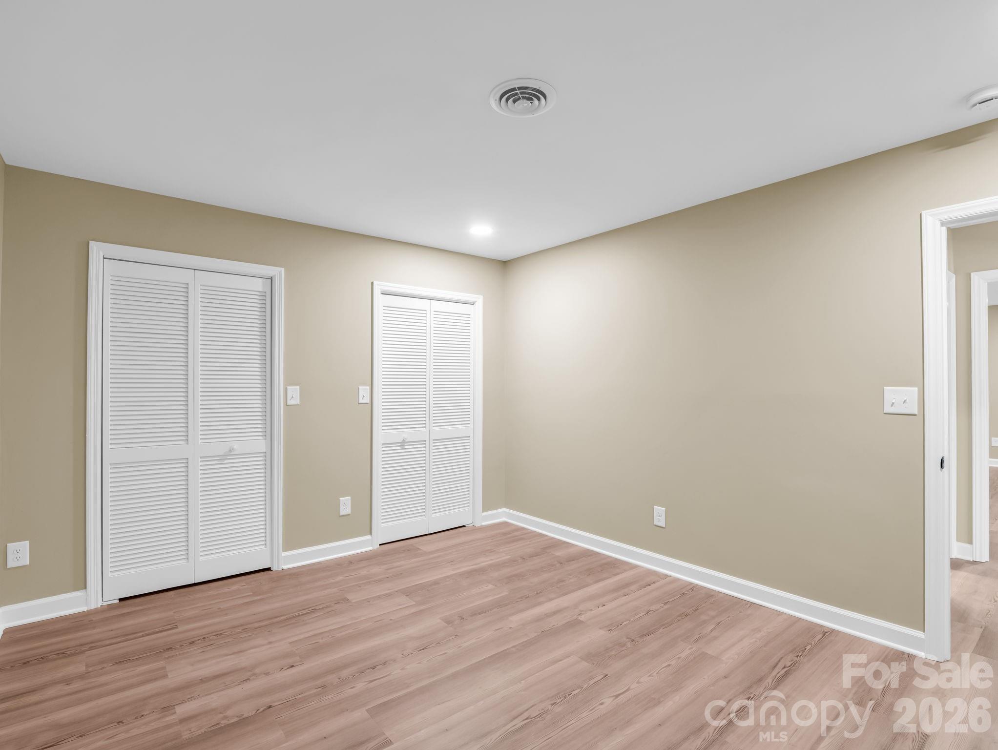 Just to the left of the guest bath is a large office/den/flex space. Two more large closets provide additional storage options. - 44 Jervey Road, Tryon
