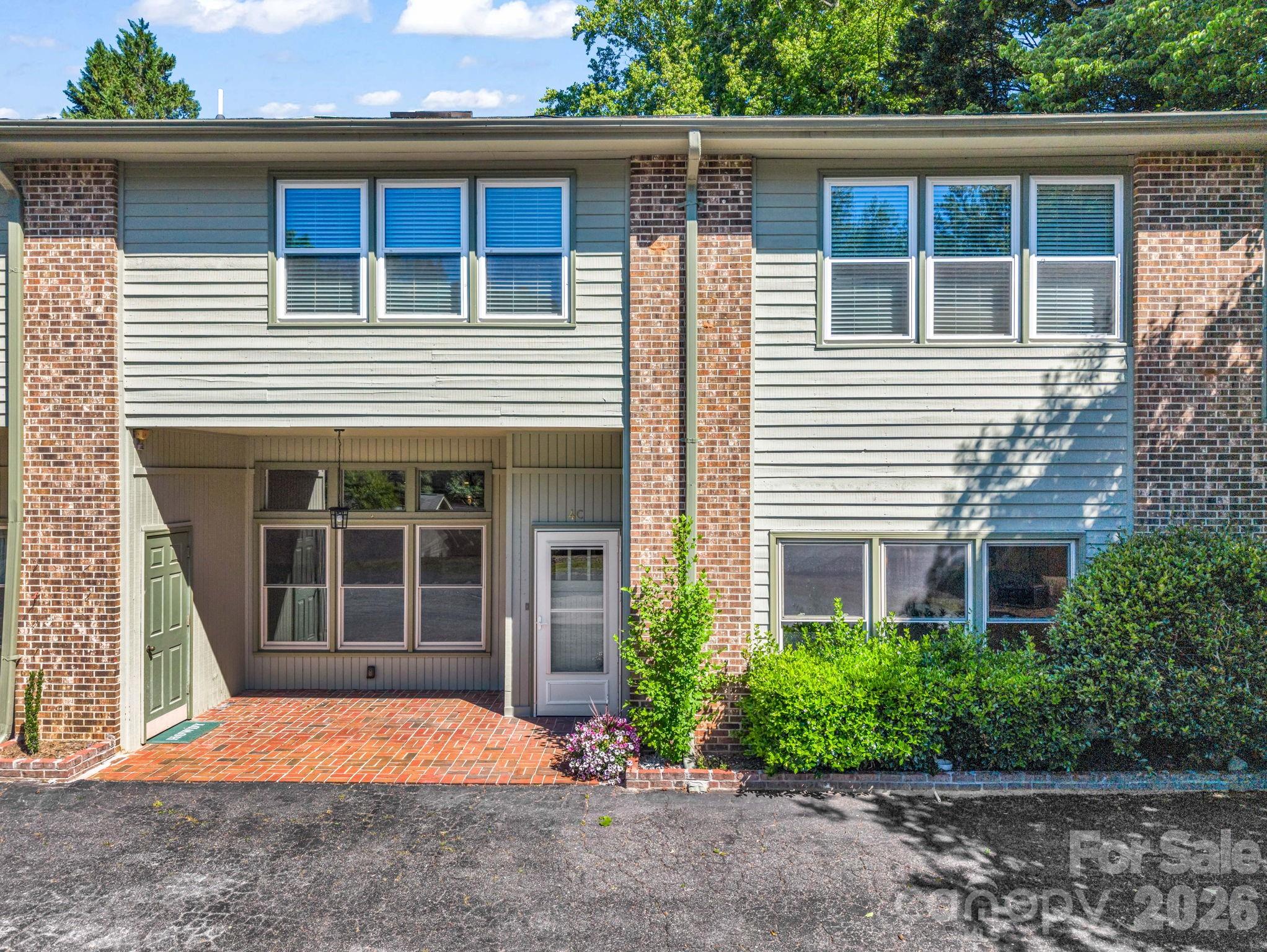 Back outside to the front, the green door on the left is a storage closet. - 44 Jervey Road, Tryon