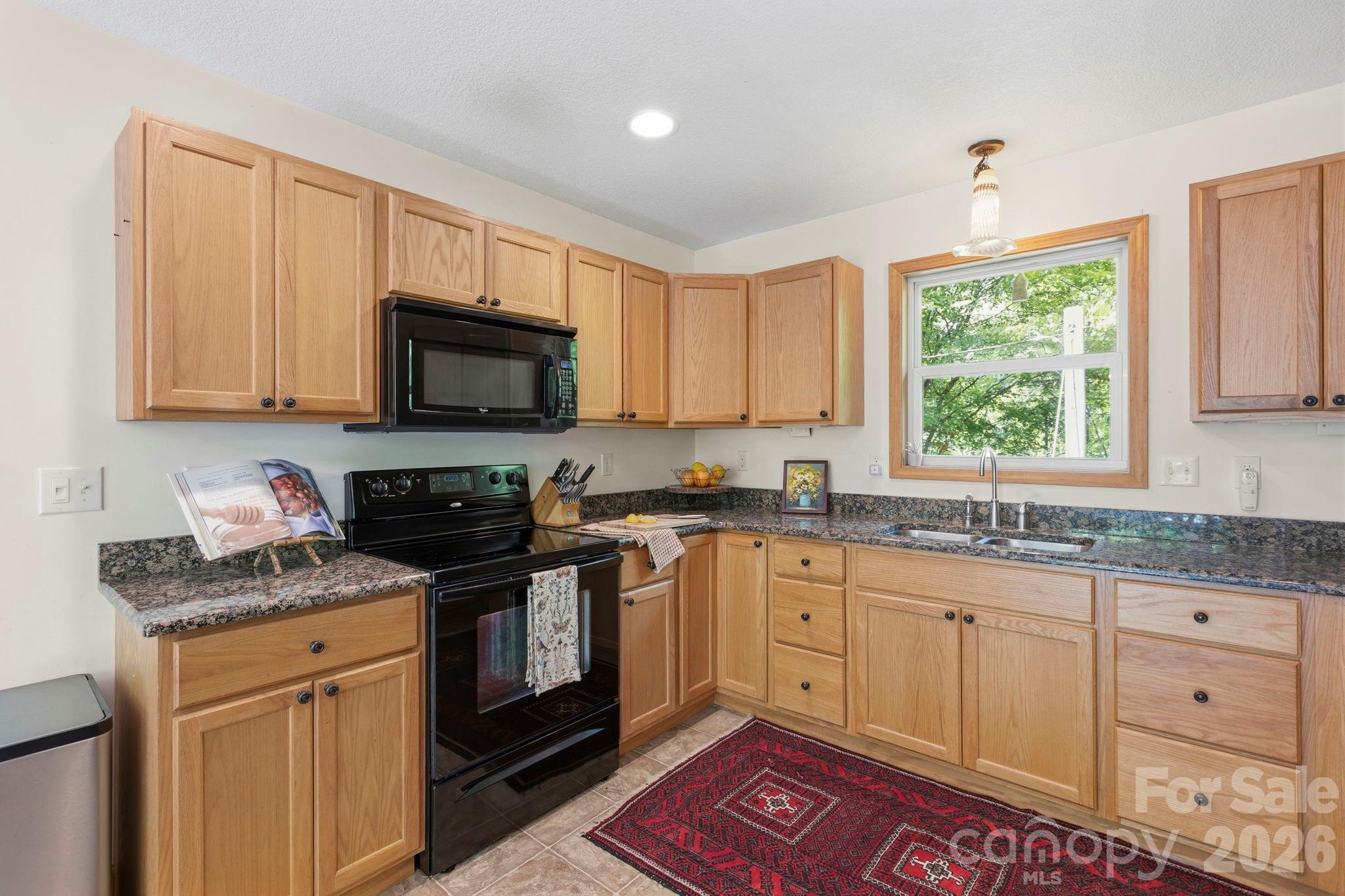 Wood cabinetry & Granite counters - 500 Winter Star Road, Burnsville