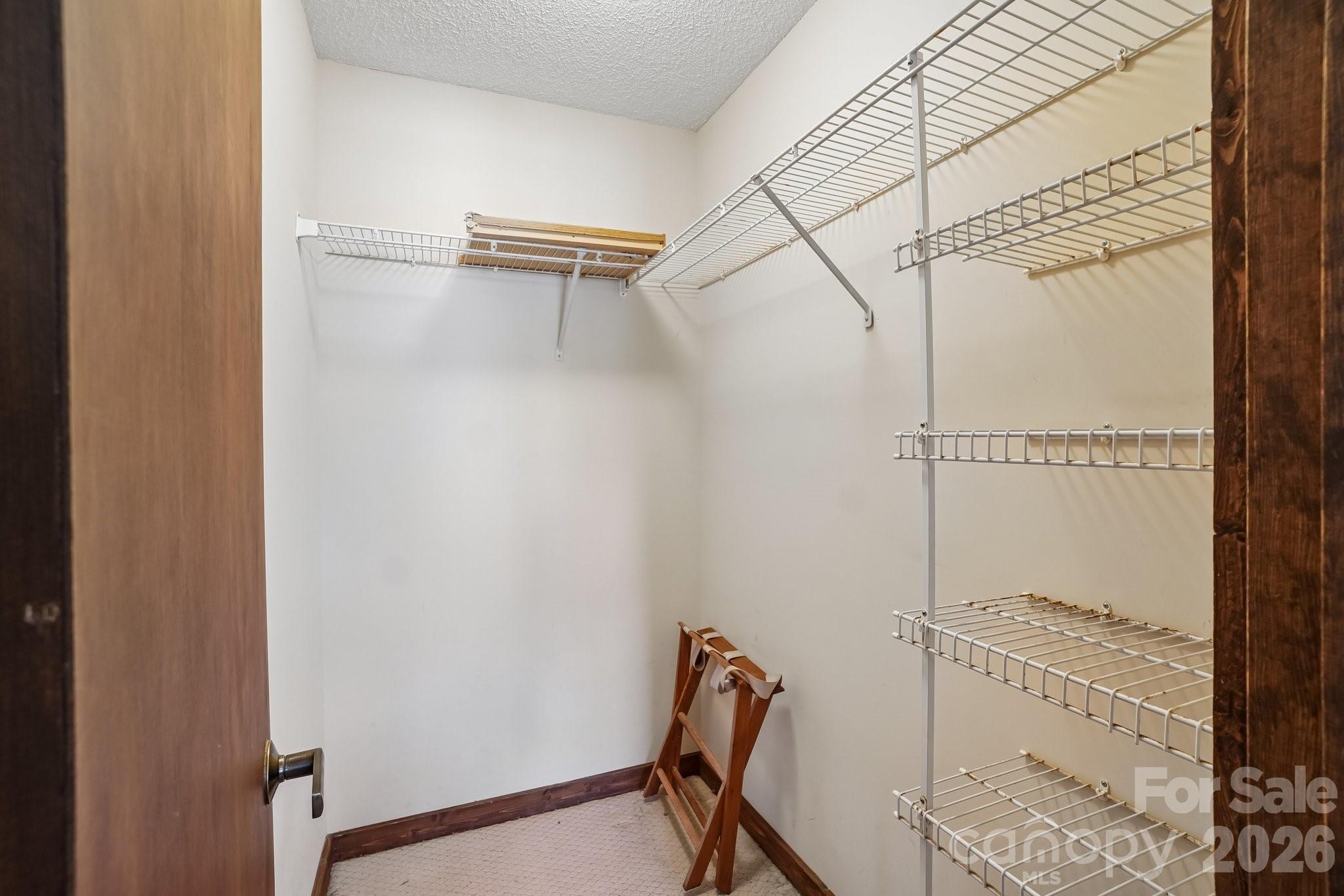 Walk in Closet in Each Primary - 302 Eagles Nest Court S, Mars Hill