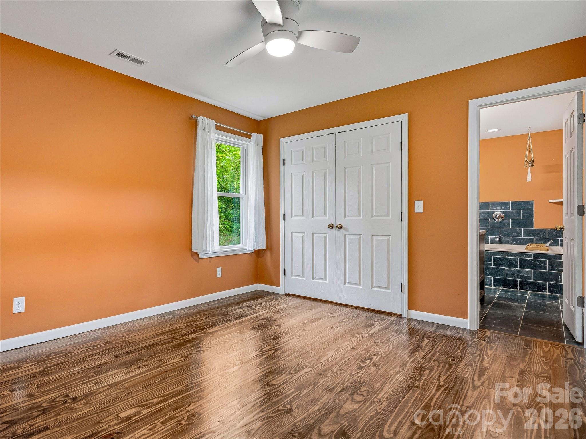 Primary Bedroom w/ En Suite Bathroom - 506 Johnston School Road, Asheville