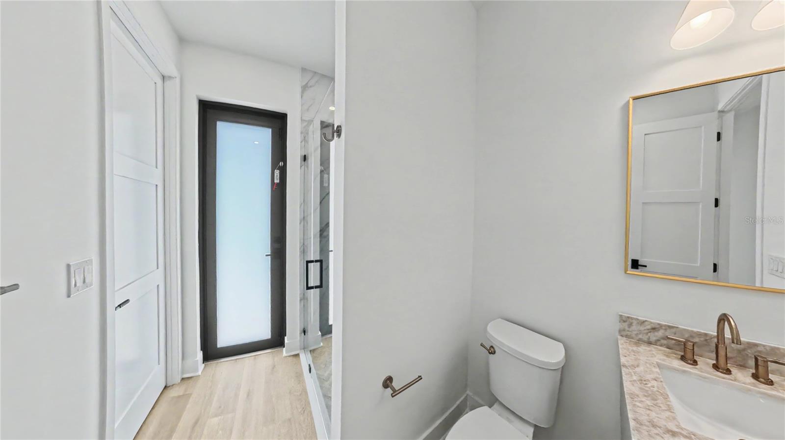 Guest Bathroom 3 with Full Shower and Access to and from Pool Area. - 16692 LIGGETT CIR, PORT CHARLOTTE