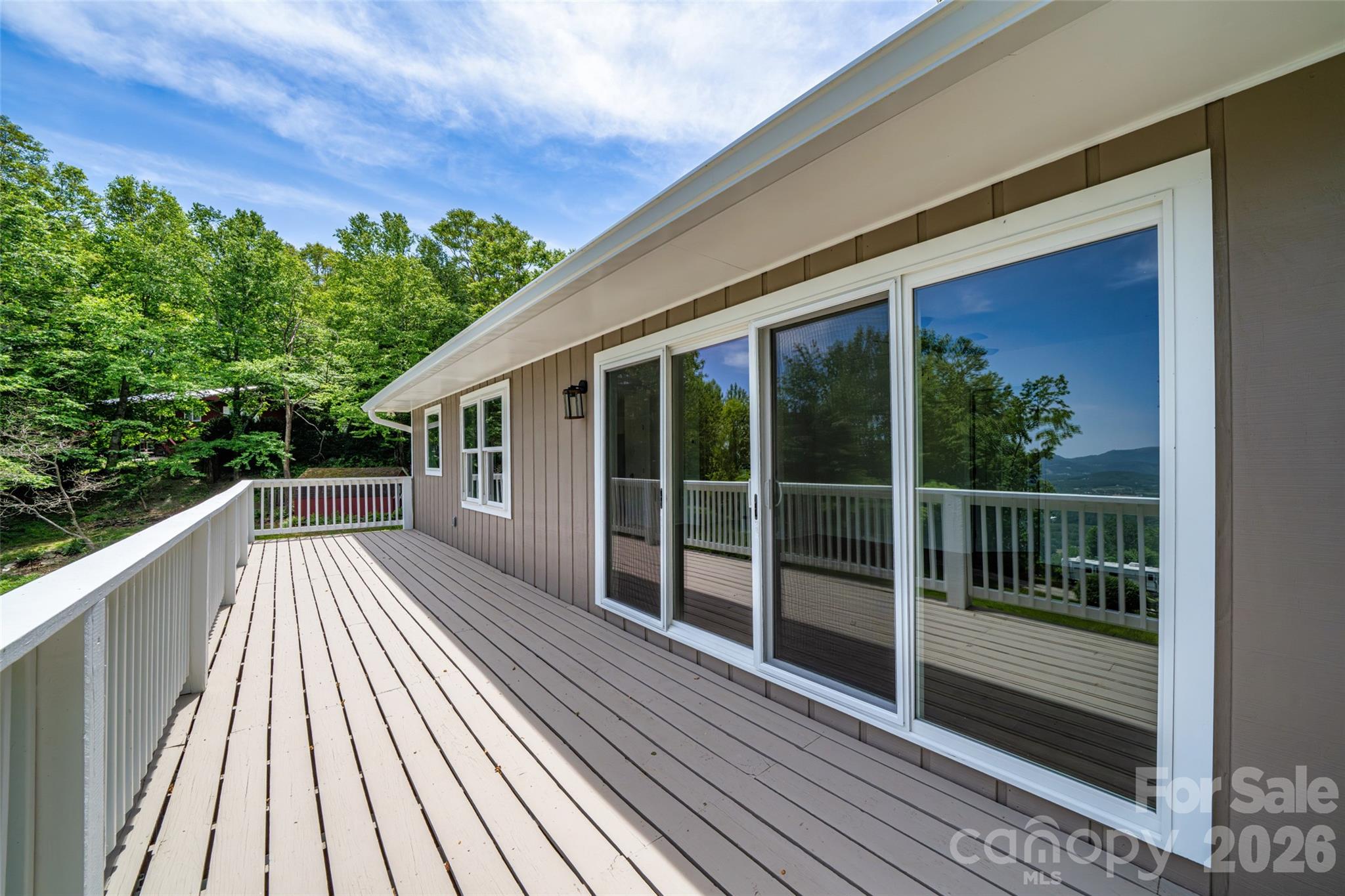Spacious deck with easy access to interior spaces - 69 Milburn Lane, Hendersonville