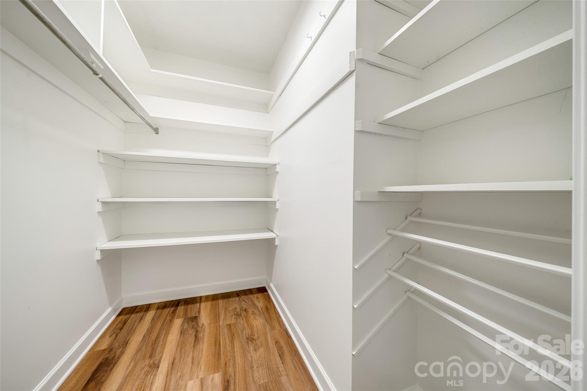 Walk-in closet with built-in storage - 69 Milburn Lane, Hendersonville