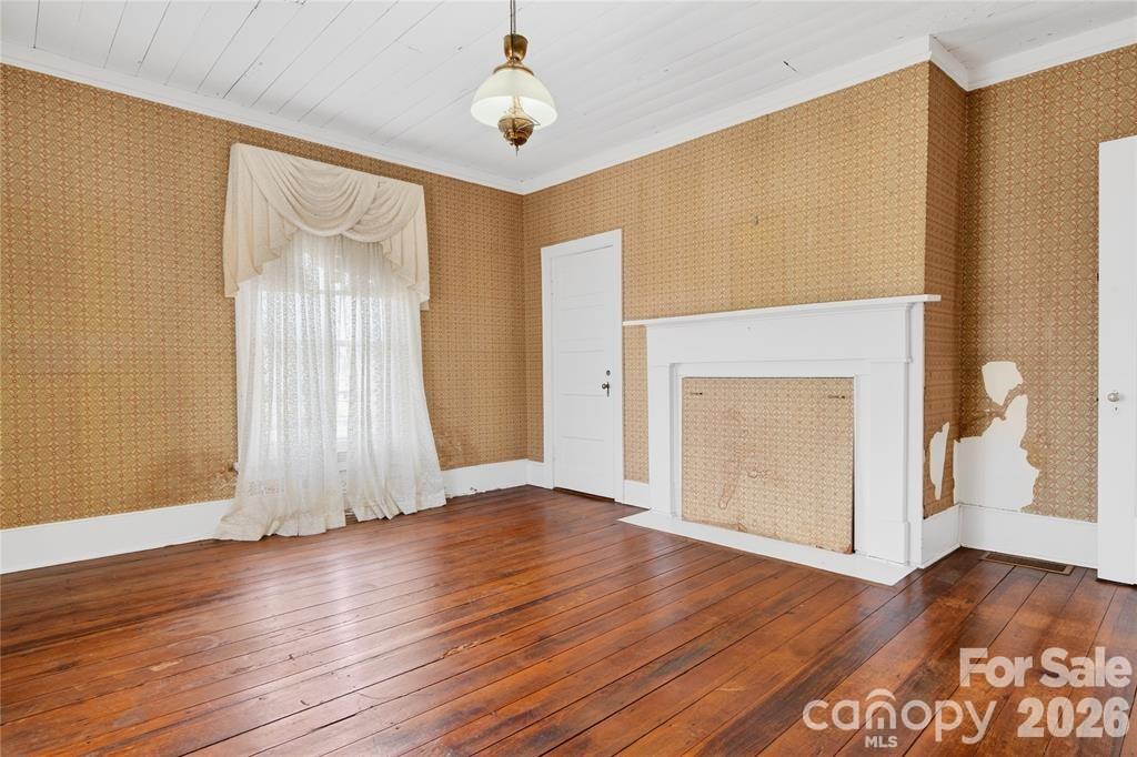 NE Bedroom upstairs has pine floors - 11124 Eastfield Road, Huntersville