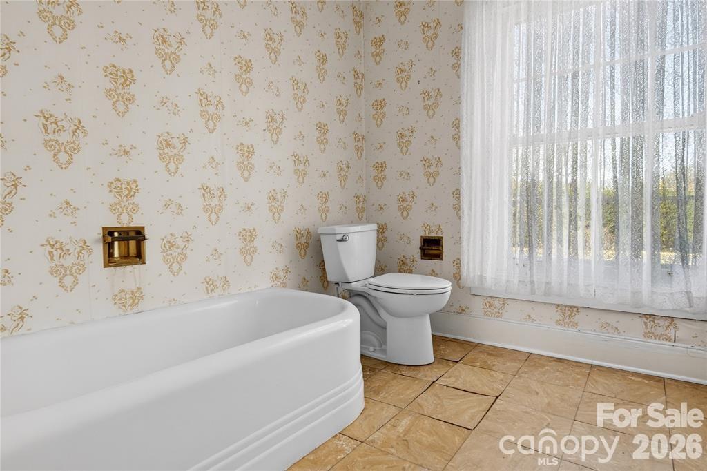 Full bathroom with vintage tub - 11124 Eastfield Road, Huntersville