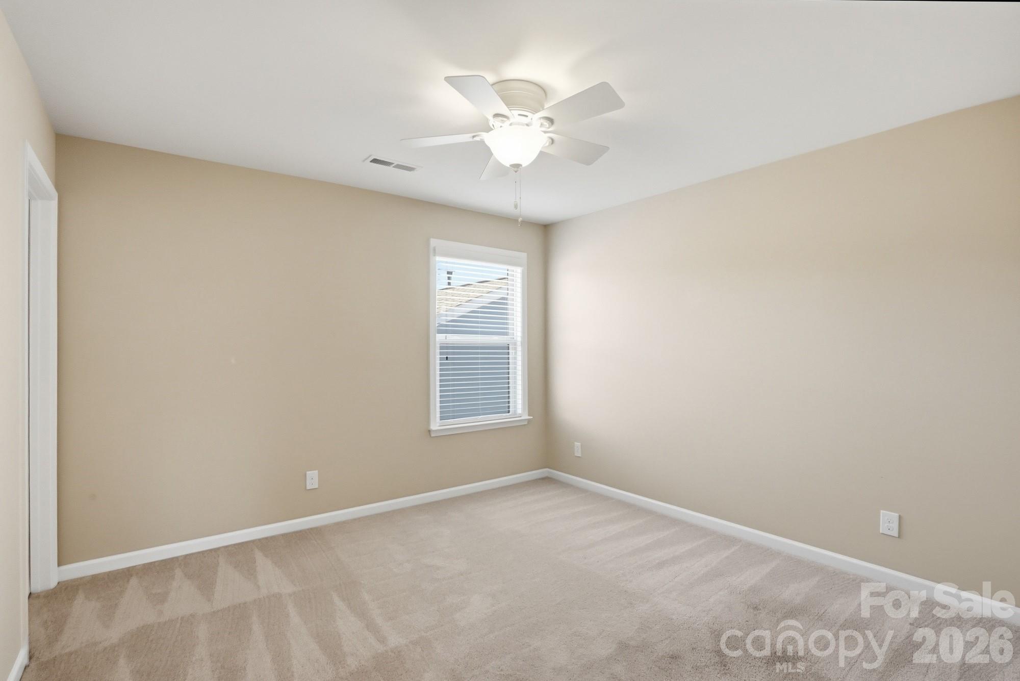A huge upstairs bedroom with its own full bath and tons of privacy—perfect for guests or a private retreat! - 2331 Currant Street, Fort Mill