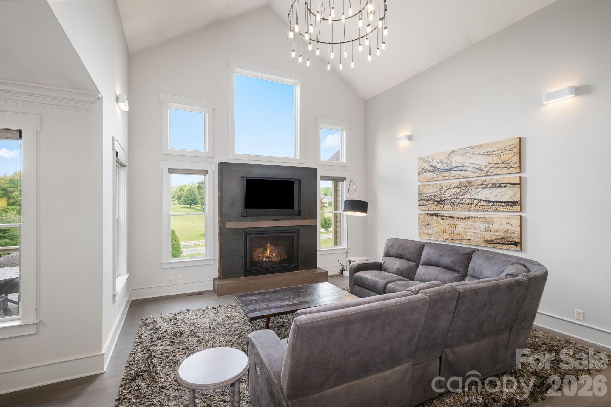 Vaulted ceiling living room with cozy gas fireplace - 31 Bradford Vistas Drive, Fletcher