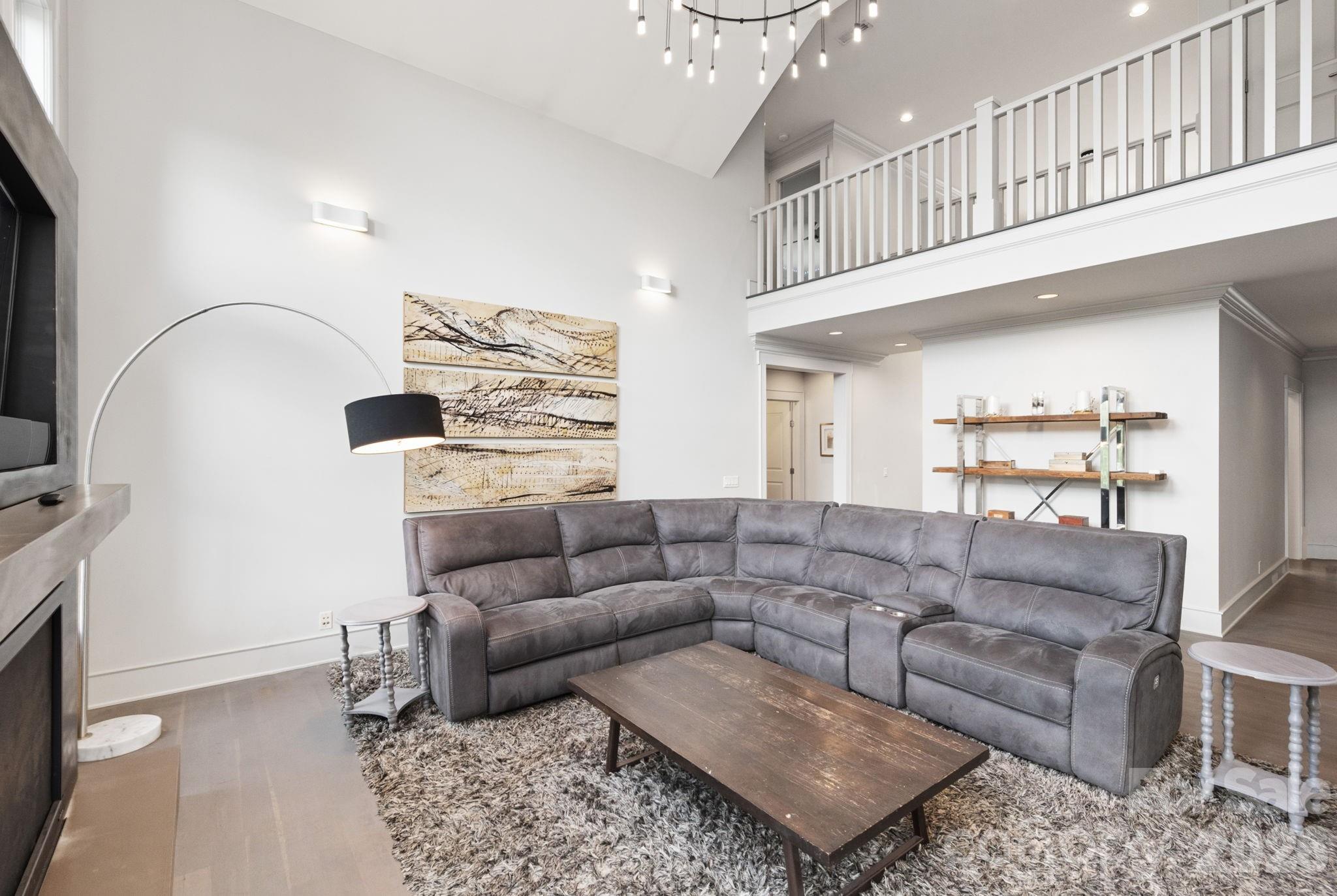 Living room easily flows to dining room and kitchen - 31 Bradford Vistas Drive, Fletcher