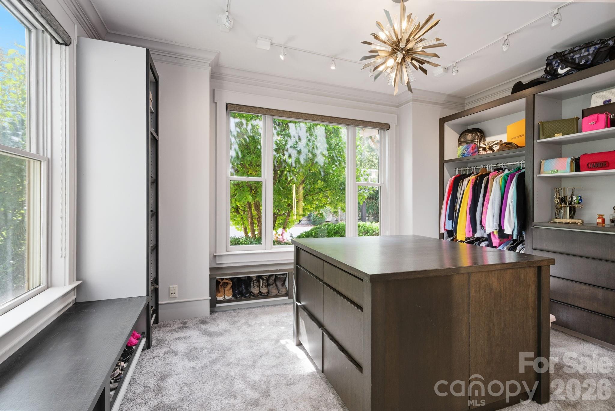 Vanity, dressers, and sitting area - 31 Bradford Vistas Drive, Fletcher
