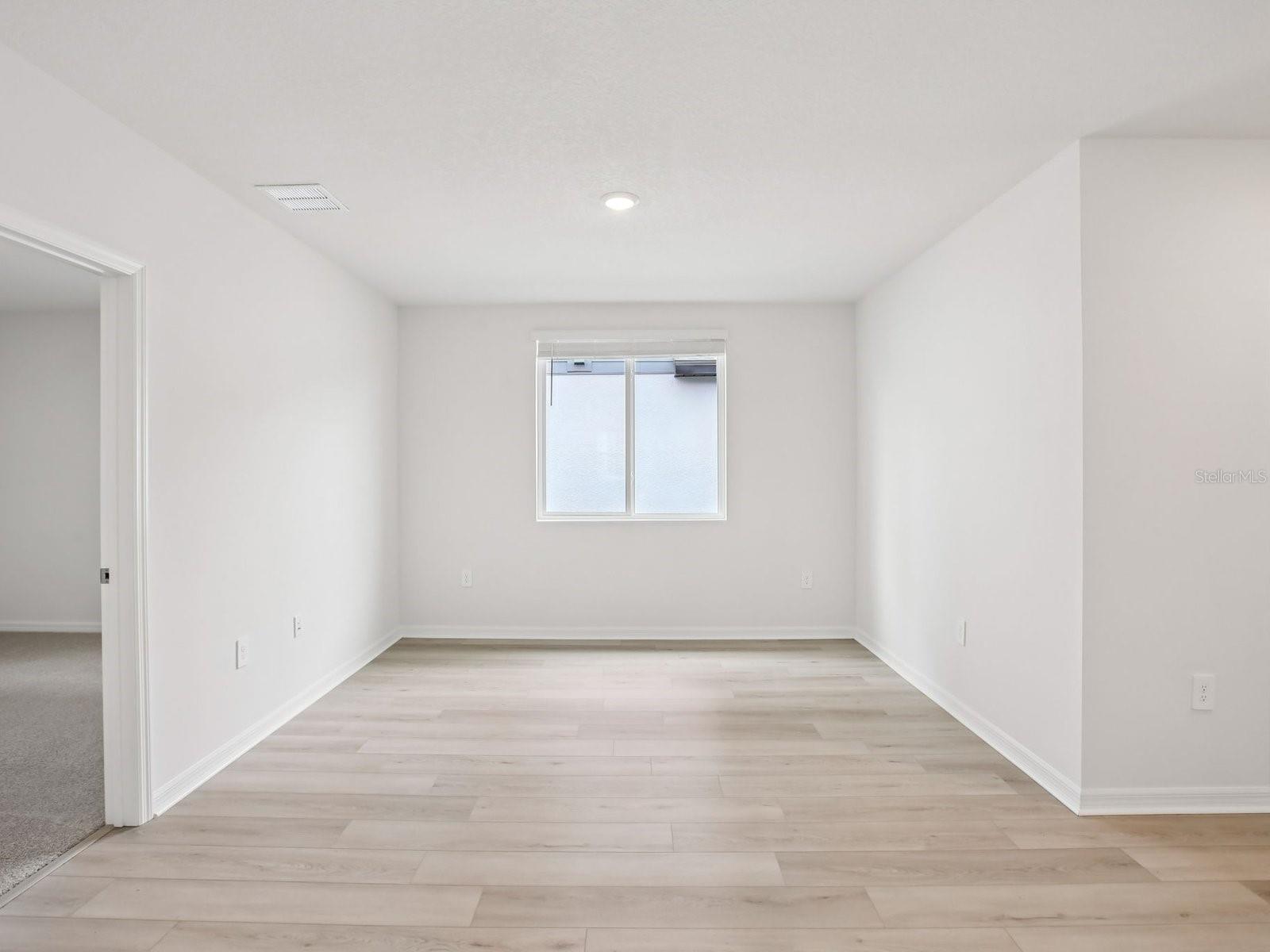 Interior photos are not of the actual home but are photos of the builder home with the same floorplan with similar interior finishes and features. - 10436 ABUNDANCE GROVE WAY, PARRISH