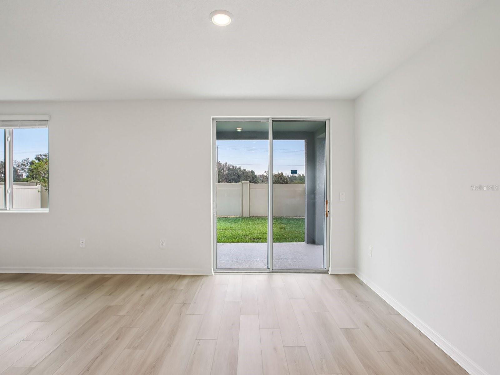 Interior photos are not of the actual home but are photos of the builder home with the same floorplan with similar interior finishes and features. - 10436 ABUNDANCE GROVE WAY, PARRISH