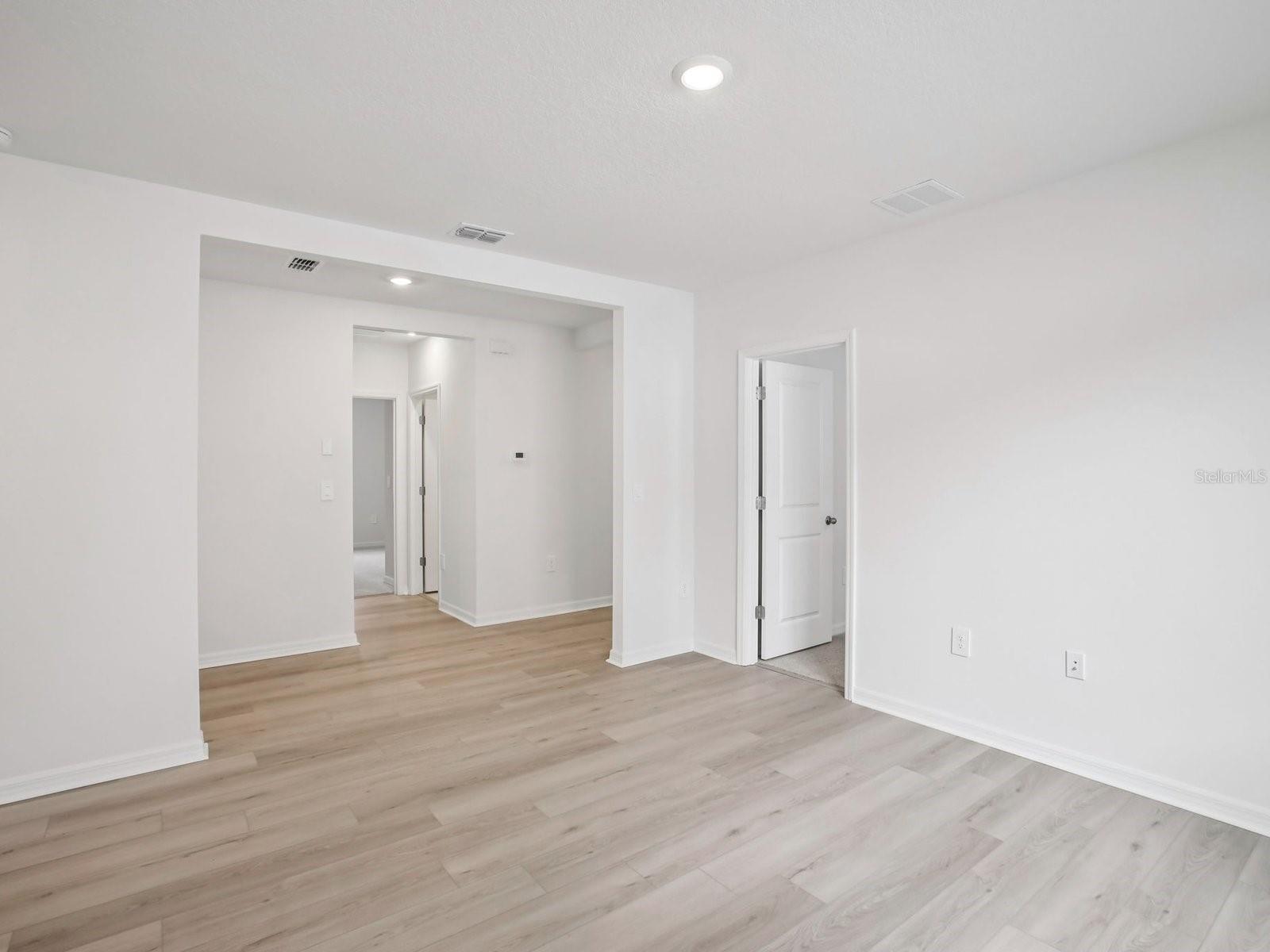 Interior photos are not of the actual home but are photos of the builder home with the same floorplan with similar interior finishes and features. - 10436 ABUNDANCE GROVE WAY, PARRISH