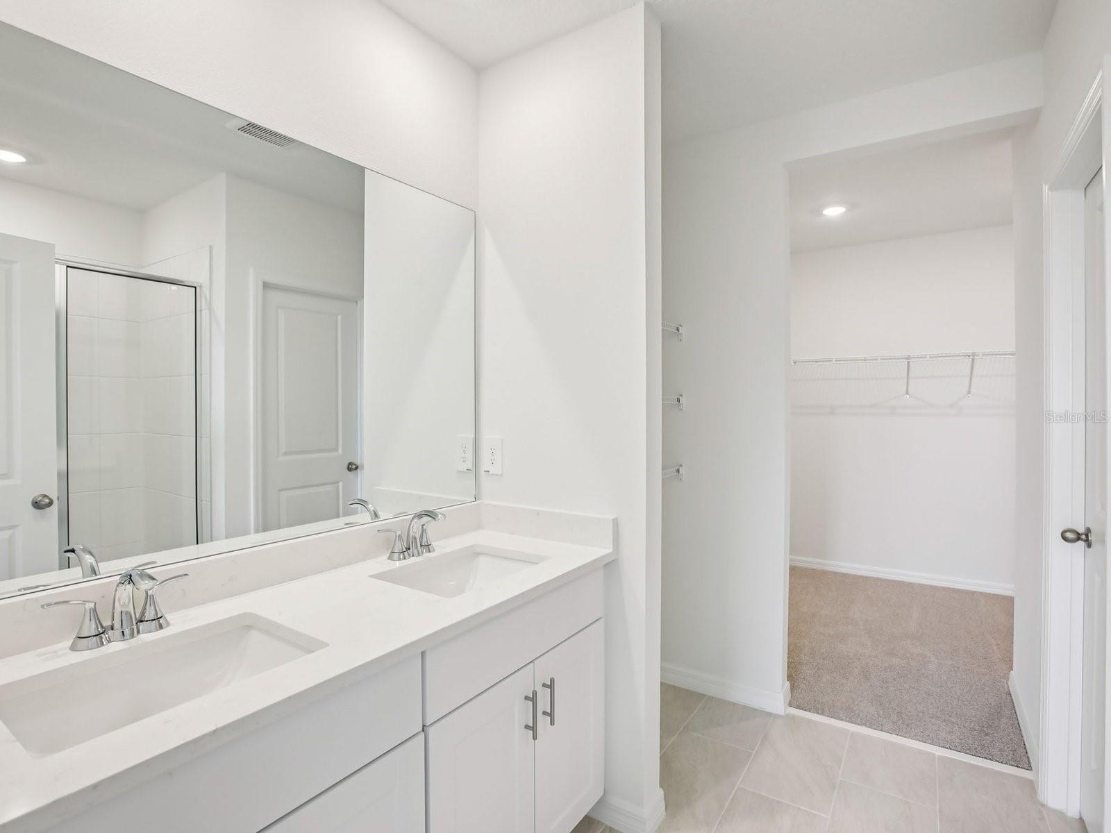 Interior photos are not of the actual home but are photos of the builder home with the same floorplan with similar interior finishes and features. - 10436 ABUNDANCE GROVE WAY, PARRISH