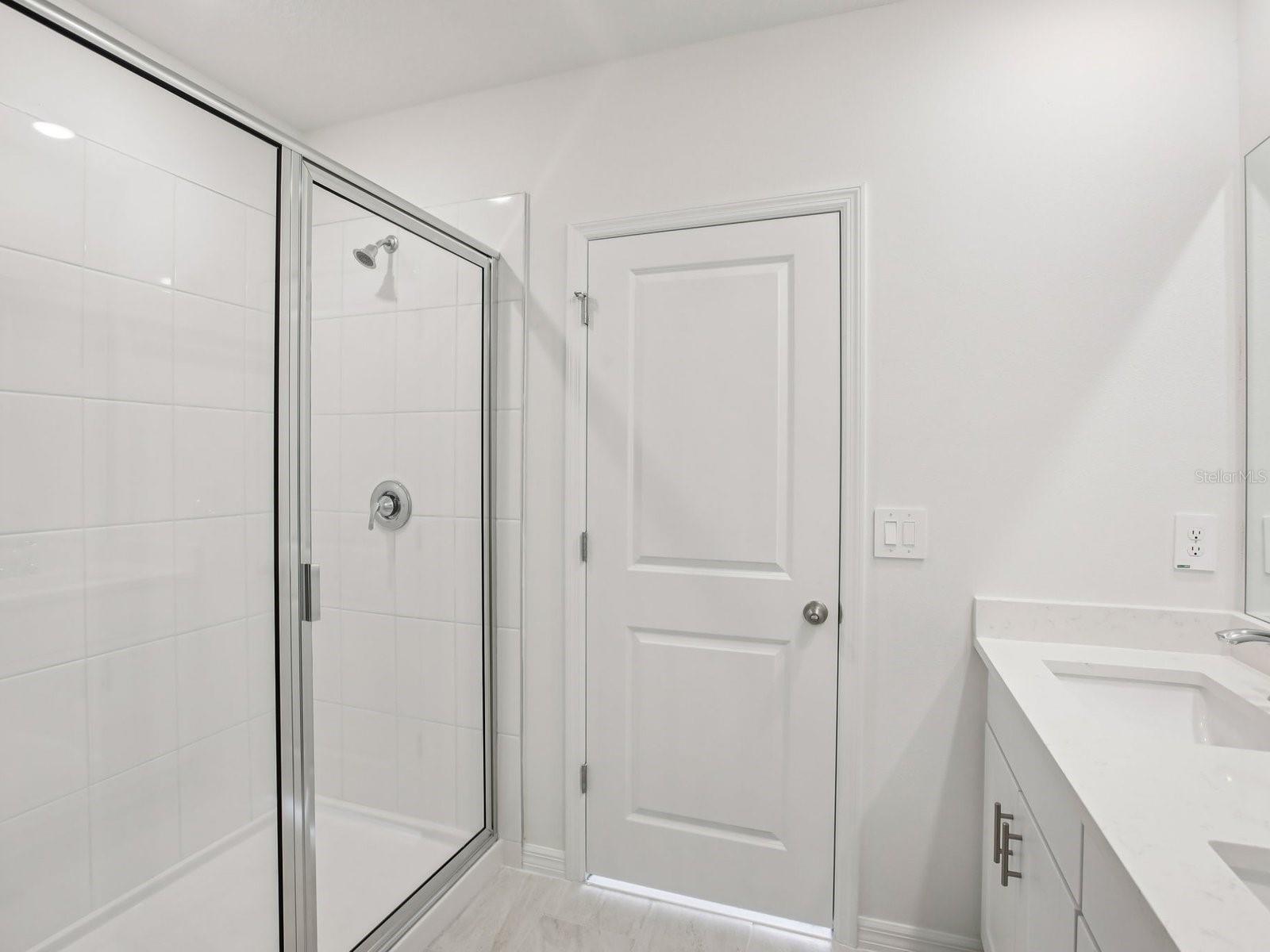 Interior photos are not of the actual home but are photos of the builder home with the same floorplan with similar interior finishes and features. - 10436 ABUNDANCE GROVE WAY, PARRISH
