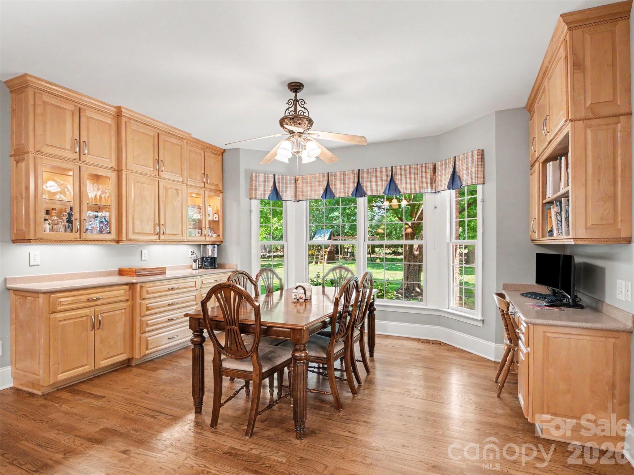 There is additional storage in the built-in buffet and desk in the bright breakfast nook off the kitchen. - 1422 Stone Gate Drive, Shelby