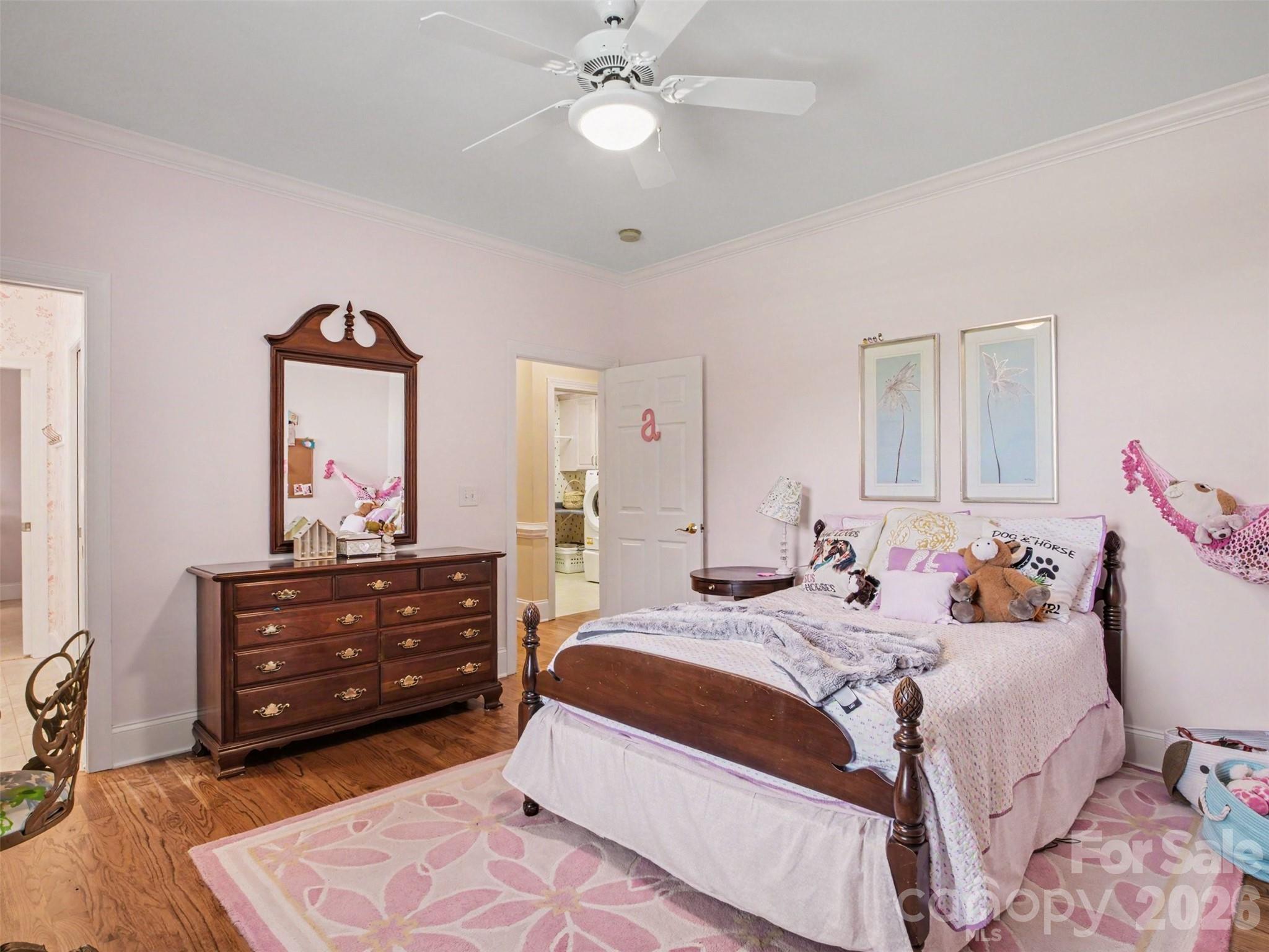 The third bedroom features natural light and hardwood floors. - 1422 Stone Gate Drive, Shelby