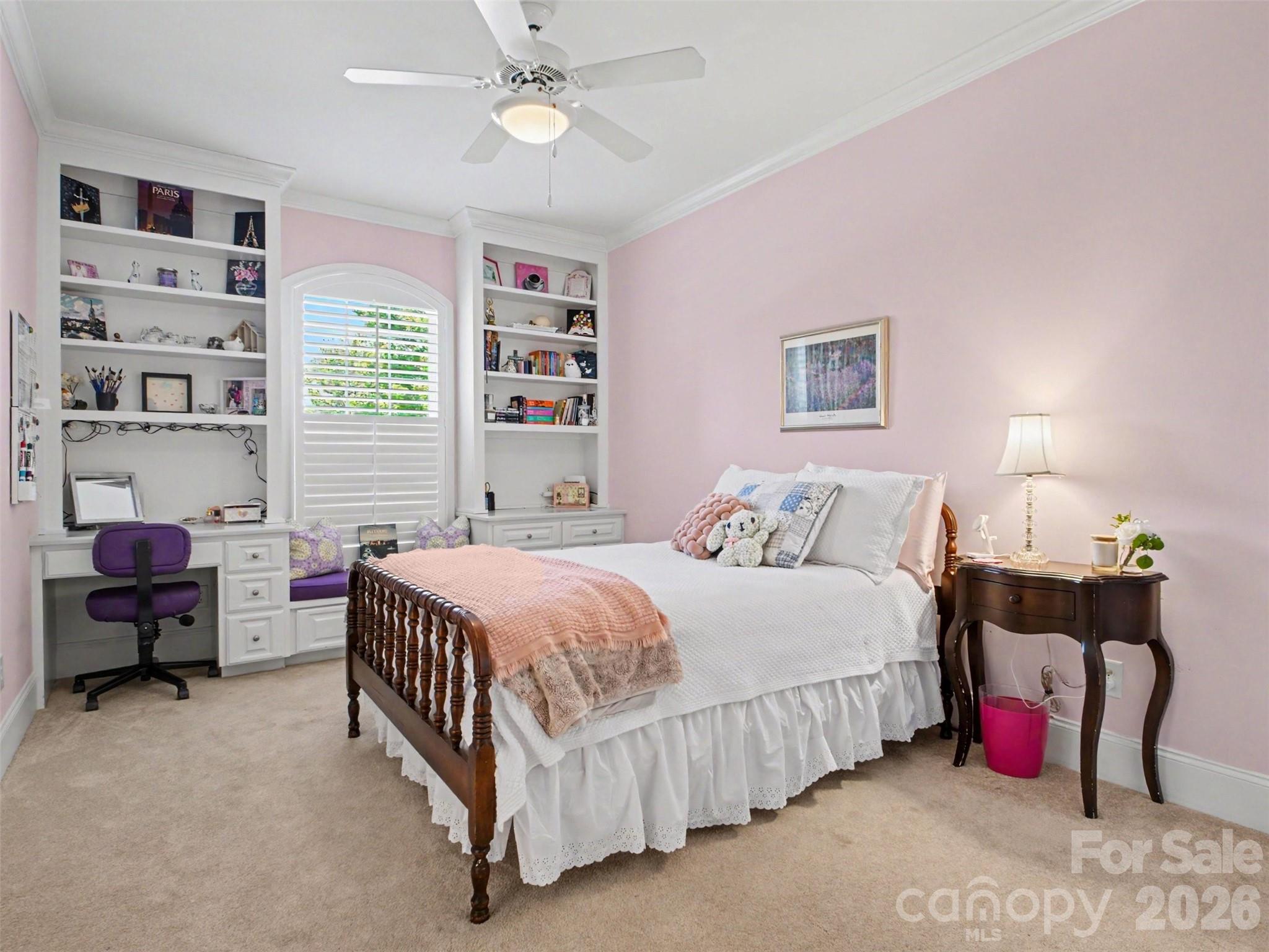 The fourth bedroom, adjacent to the Jack and Jill bath, has an adorable window seat, built-ins,... - 1422 Stone Gate Drive, Shelby