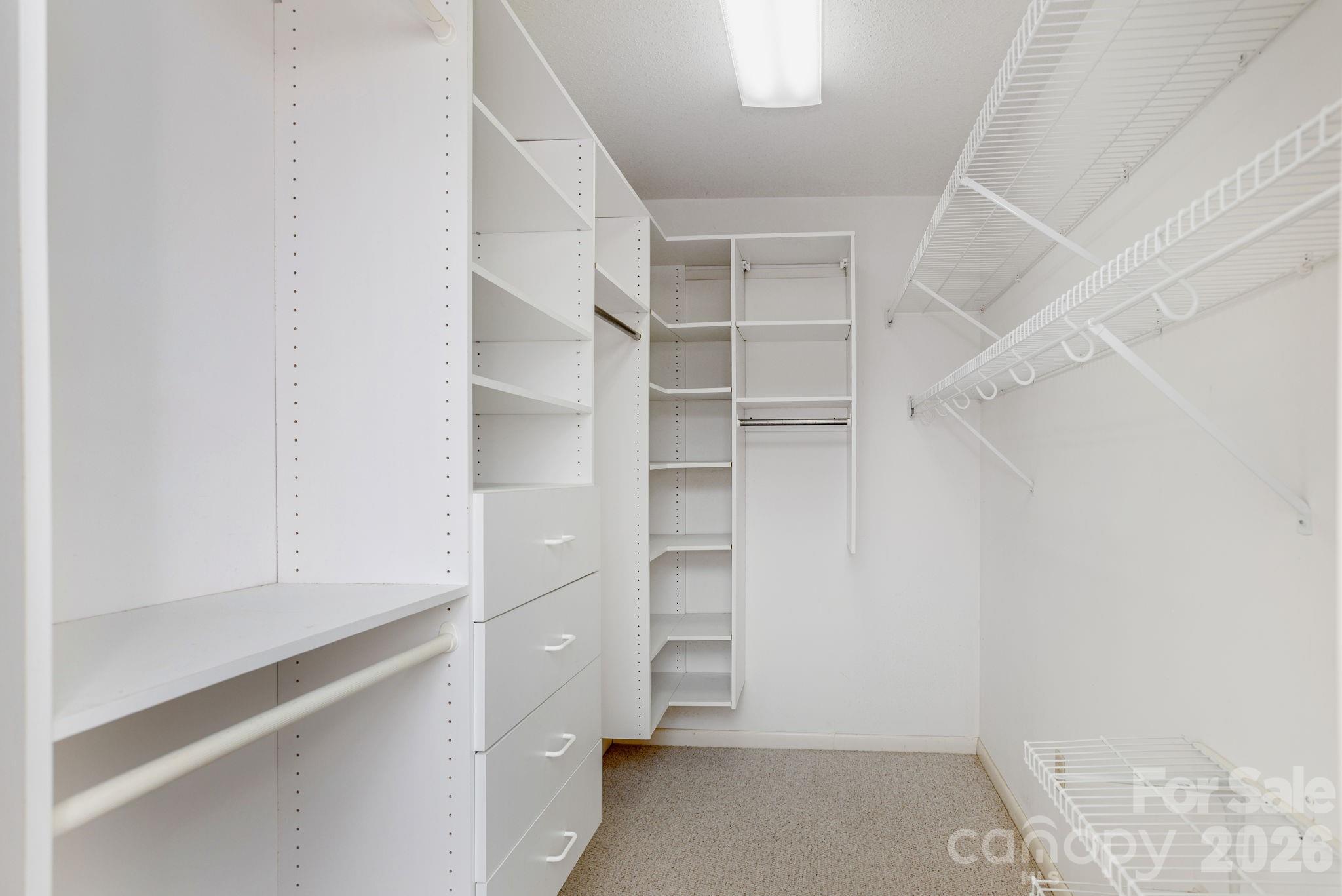 Guest walk-in closet - 250 Butternut Lane, Brevard