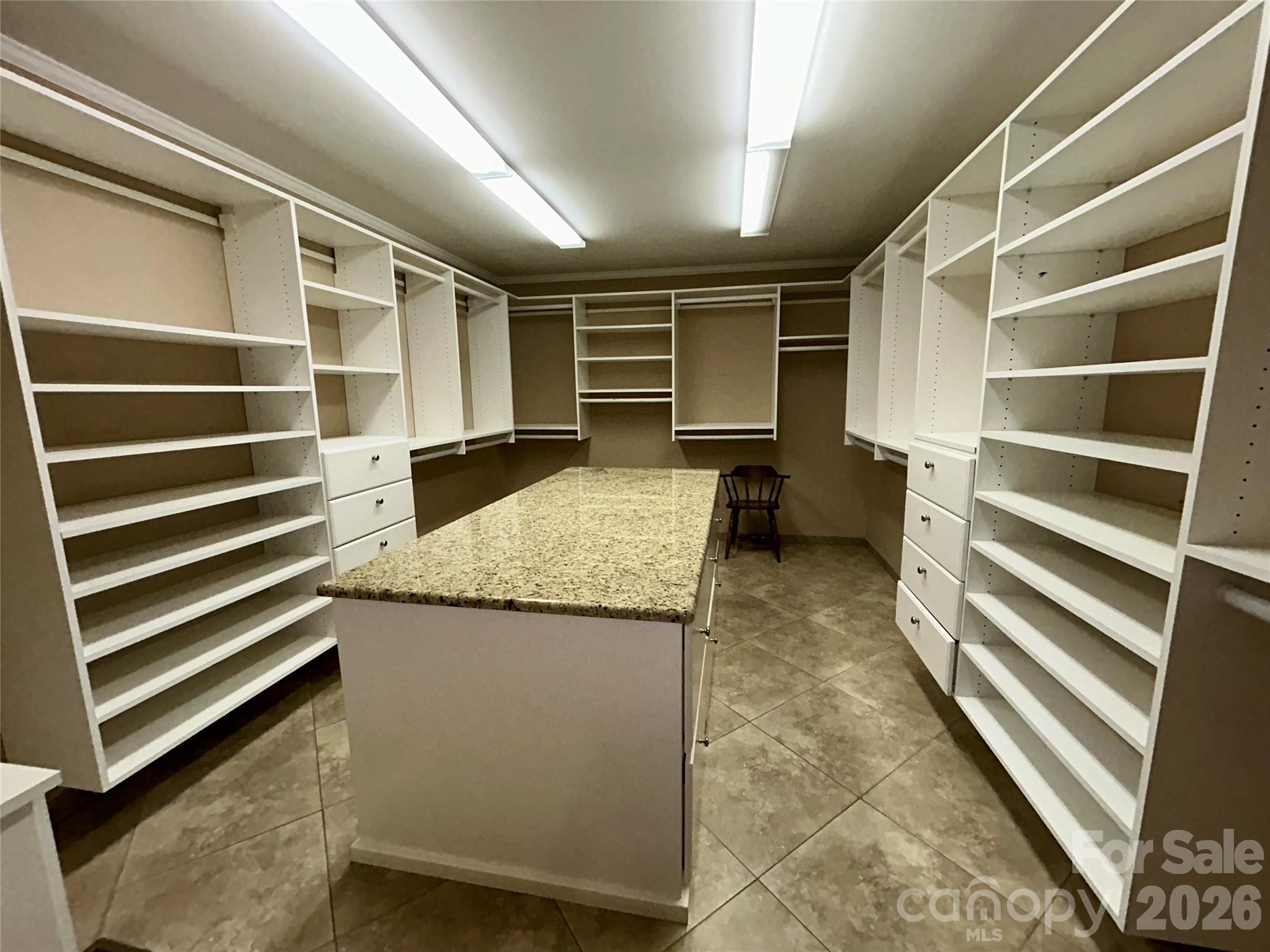First-floor primary closet to die for!!! - 900 Courtney Court SE, Concord