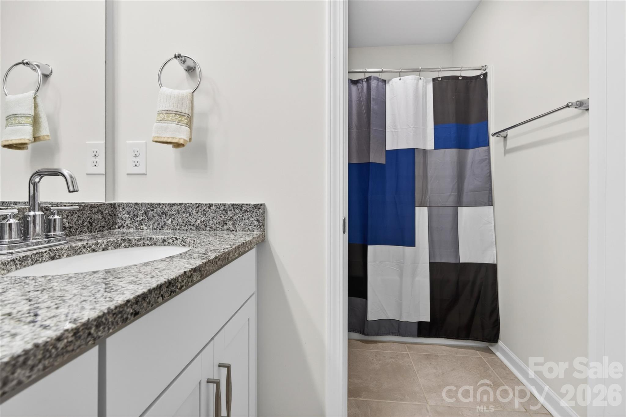 Upper bath is functional for busy lives with separate shower/toilet area from vanity. - 4192 Steel Way, Sherrills Ford