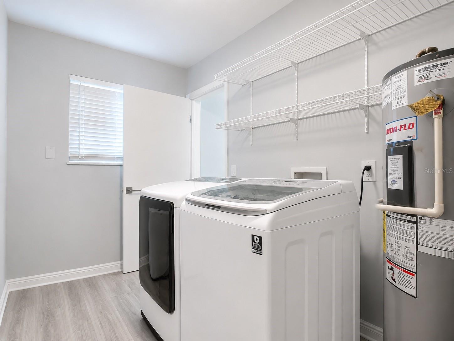 downstairs laundry room - 742 LAUREL BAY CIR, NEW SMYRNA BEACH