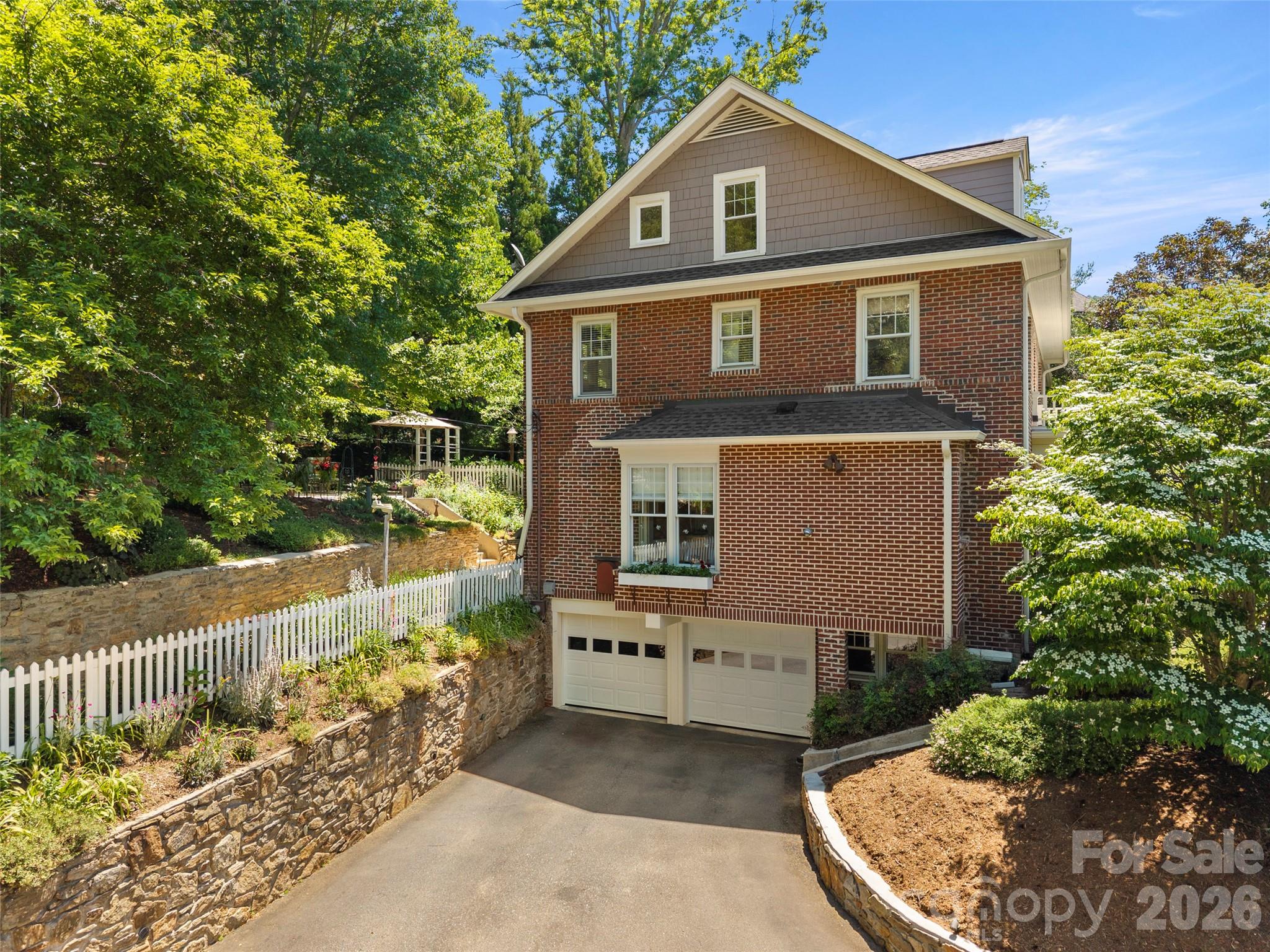 Drive-in two car garage, with a third tandem parking space - 19 Blackwood Road, Asheville
