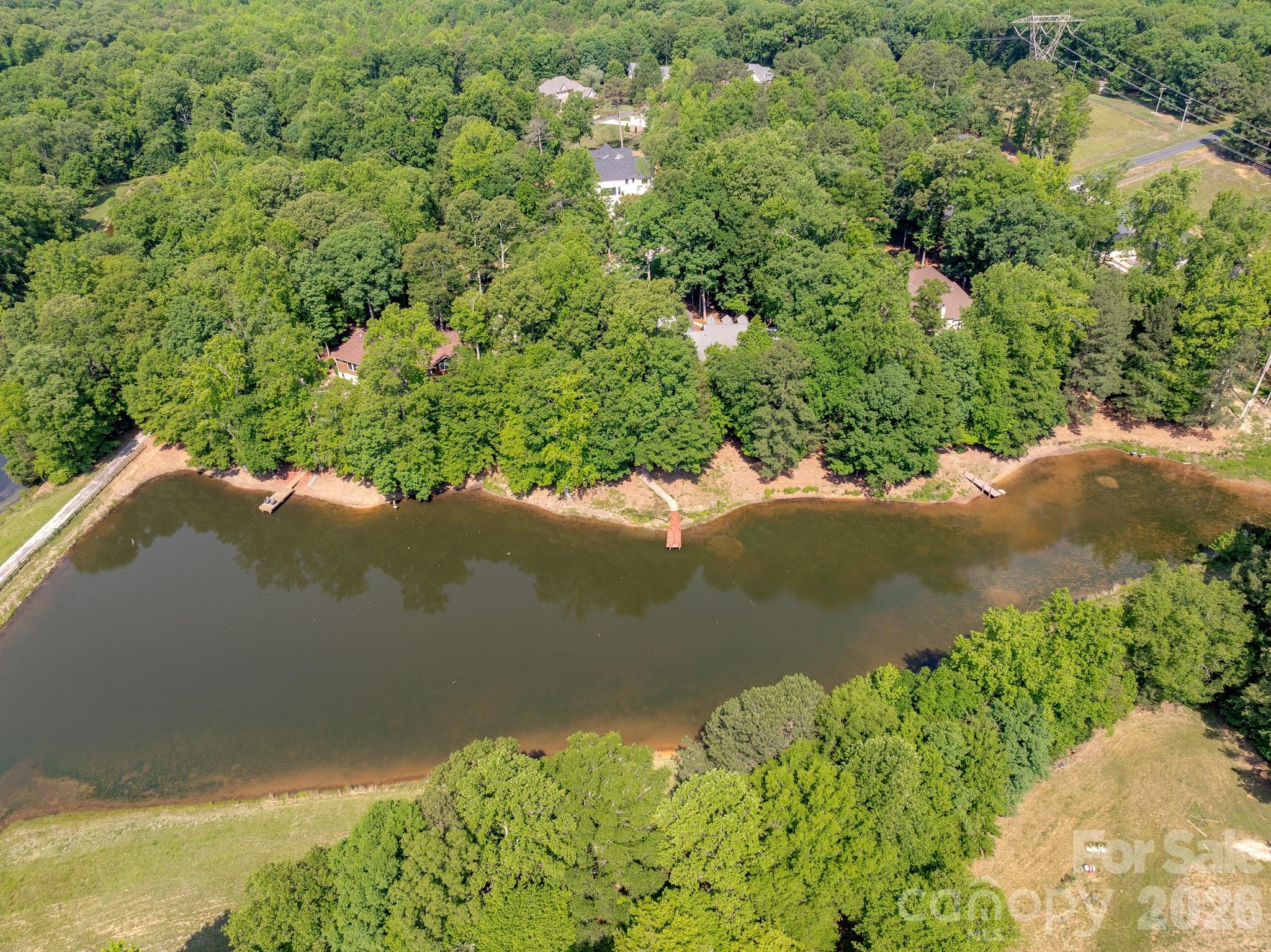 Private stream fed lake. - 4709 Rockwood Drive, Waxhaw