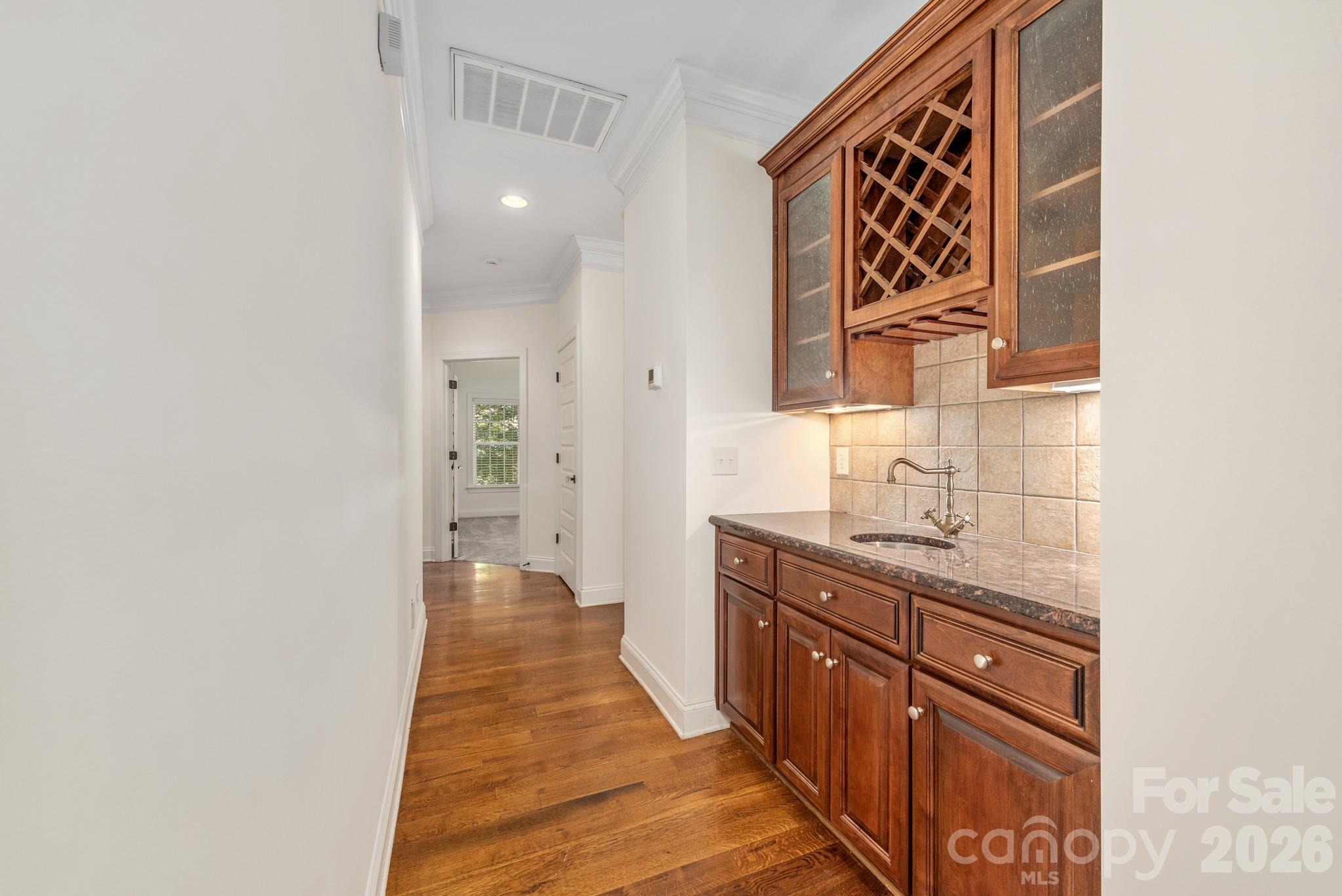 Dry Bar between the Dining Room and Kitchen. - 4709 Rockwood Drive, Waxhaw