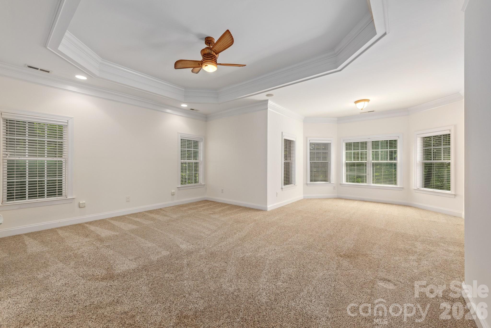 Primary Bedroom with Private Seating Area. - 4709 Rockwood Drive, Waxhaw