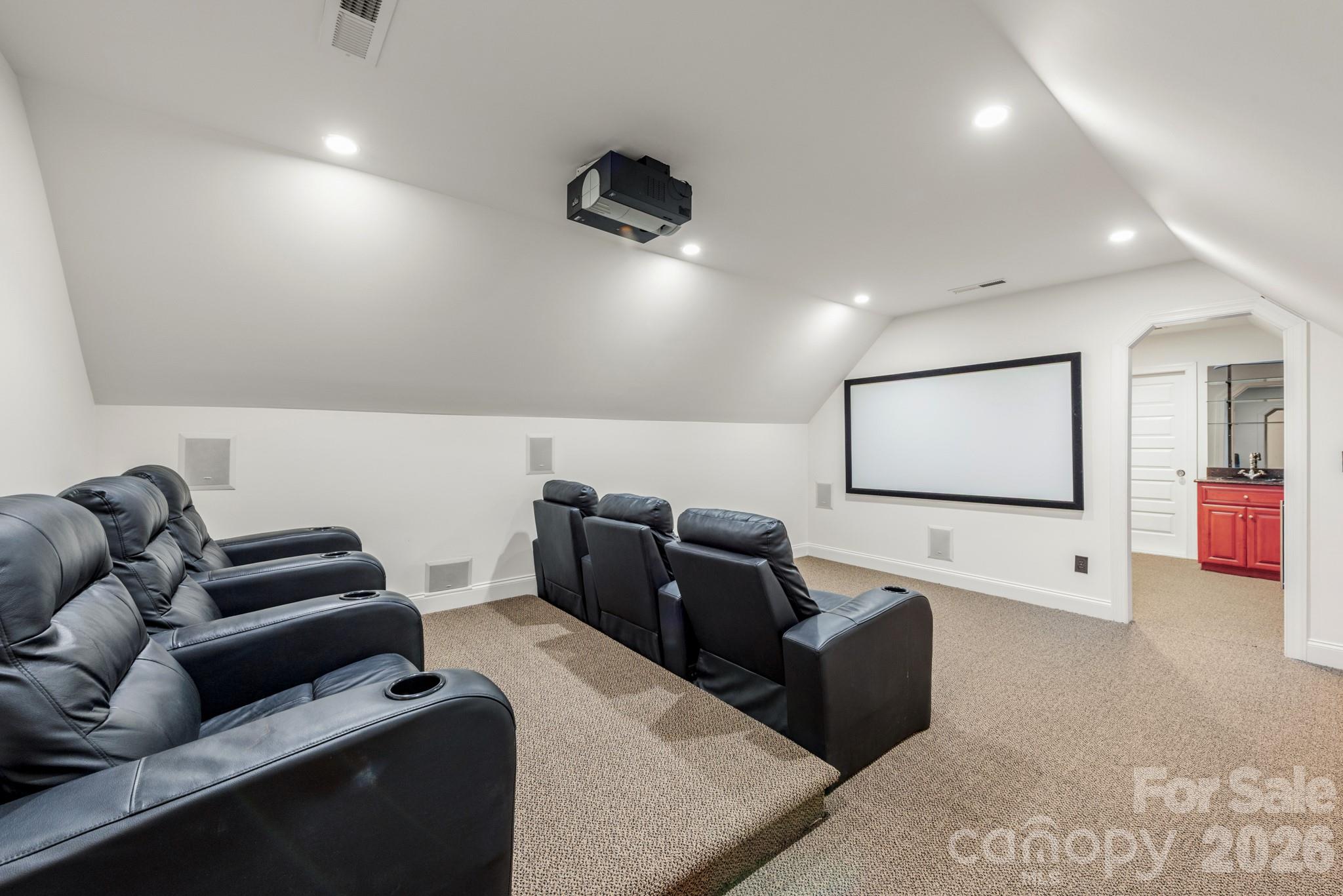 Built in theater seating. - 4709 Rockwood Drive, Waxhaw