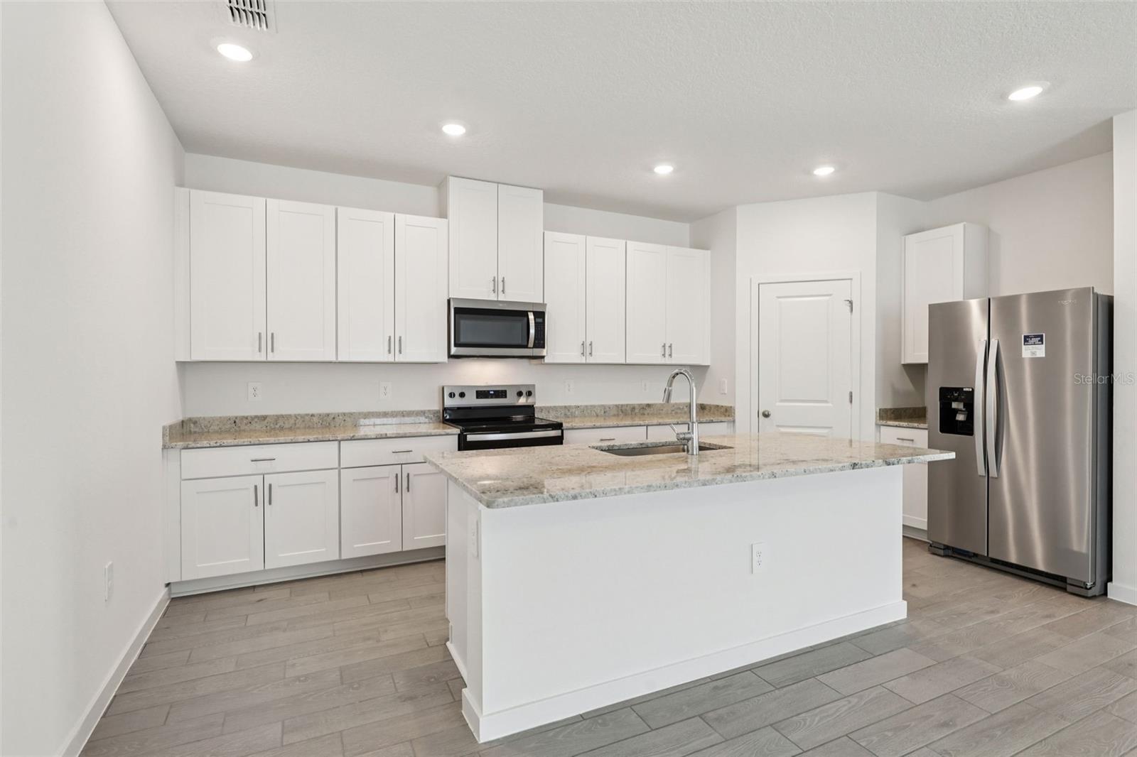 The interior photos are of another home with the same floor plan and interior finishes. Some details may vary - 71 WANDERING CREEK WAY, PALM COAST
