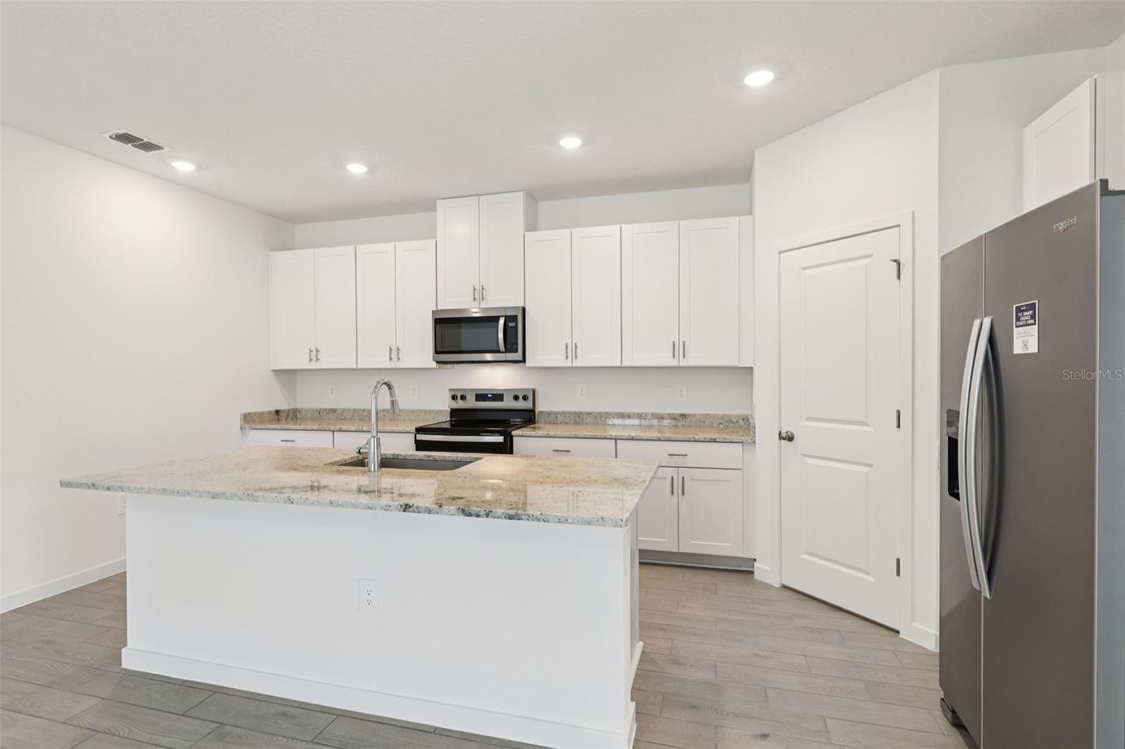 The interior photos are of another home with the same floor plan and interior finishes. Some details may vary - 71 WANDERING CREEK WAY, PALM COAST