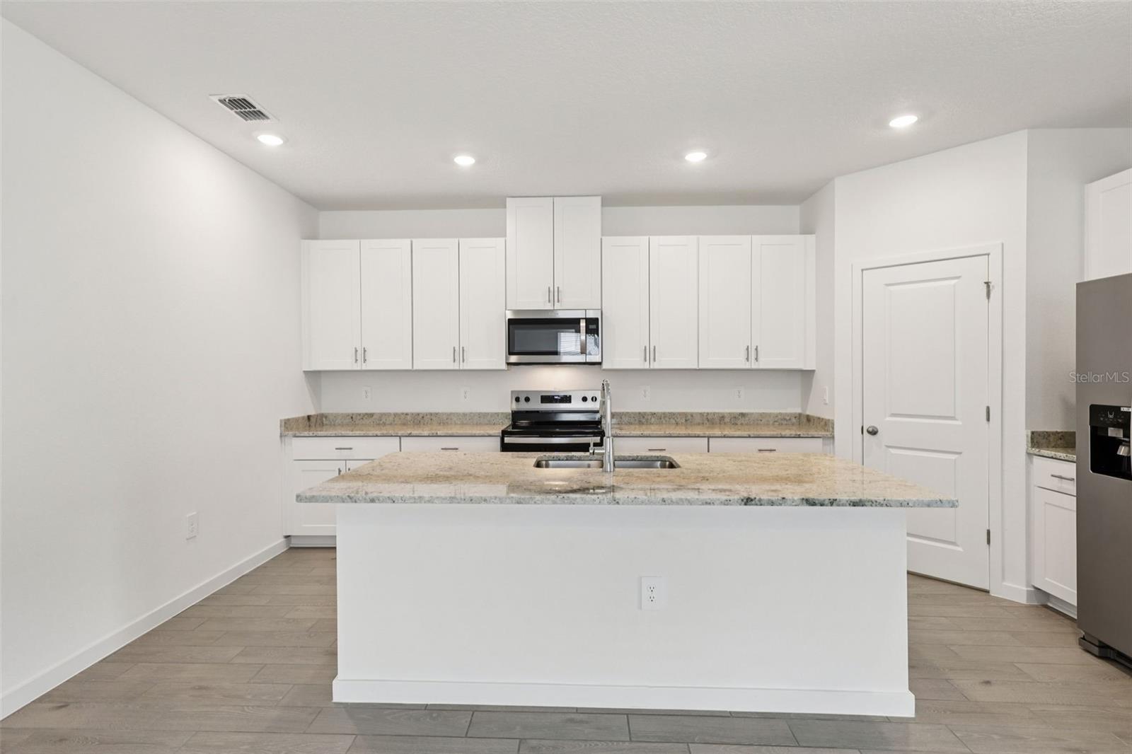 The interior photos are of another home with the same floor plan and interior finishes. Some details may vary - 71 WANDERING CREEK WAY, PALM COAST