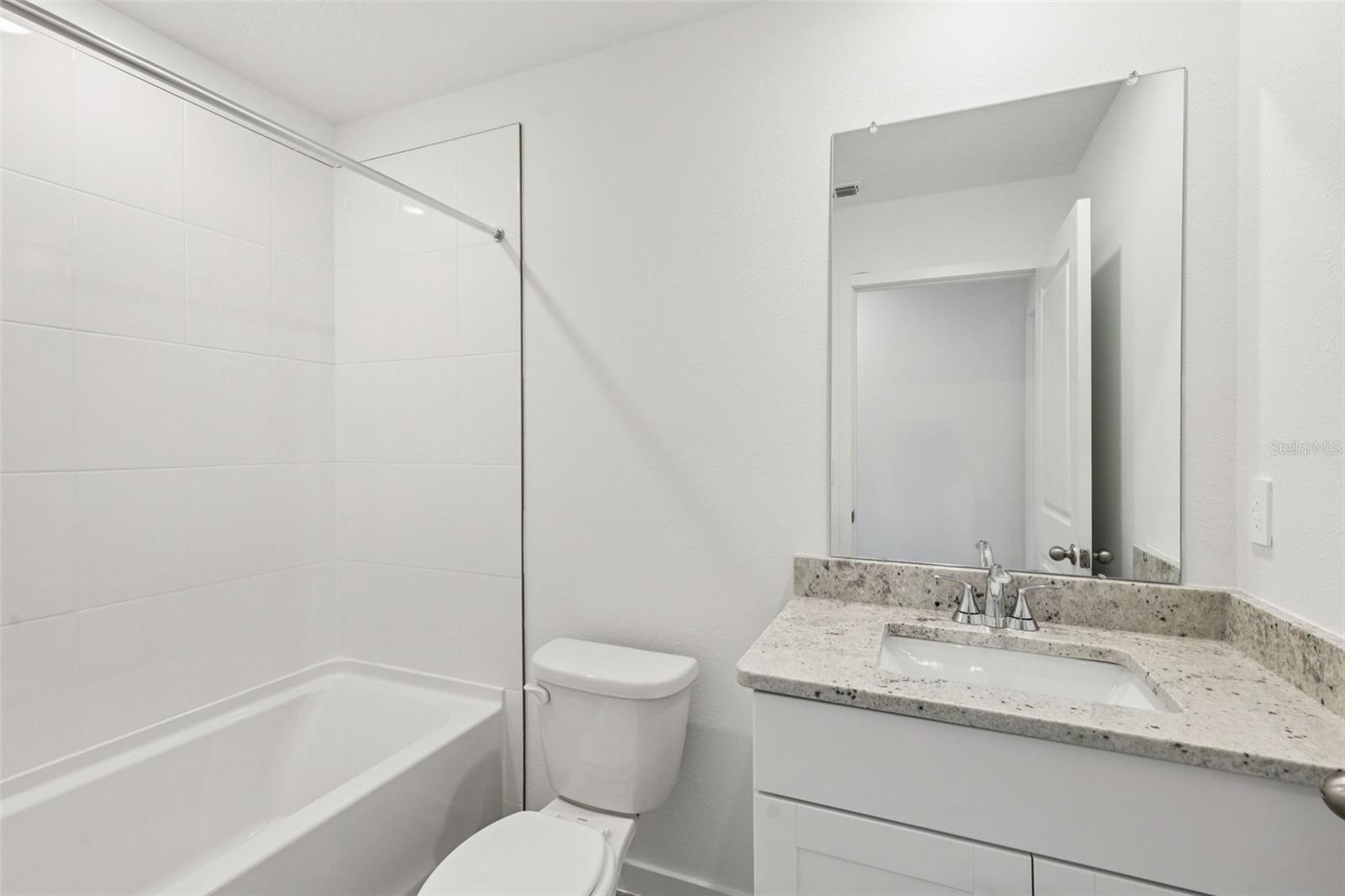 The interior photos are of another home with the same floor plan and interior finishes. Some details may vary - 71 WANDERING CREEK WAY, PALM COAST