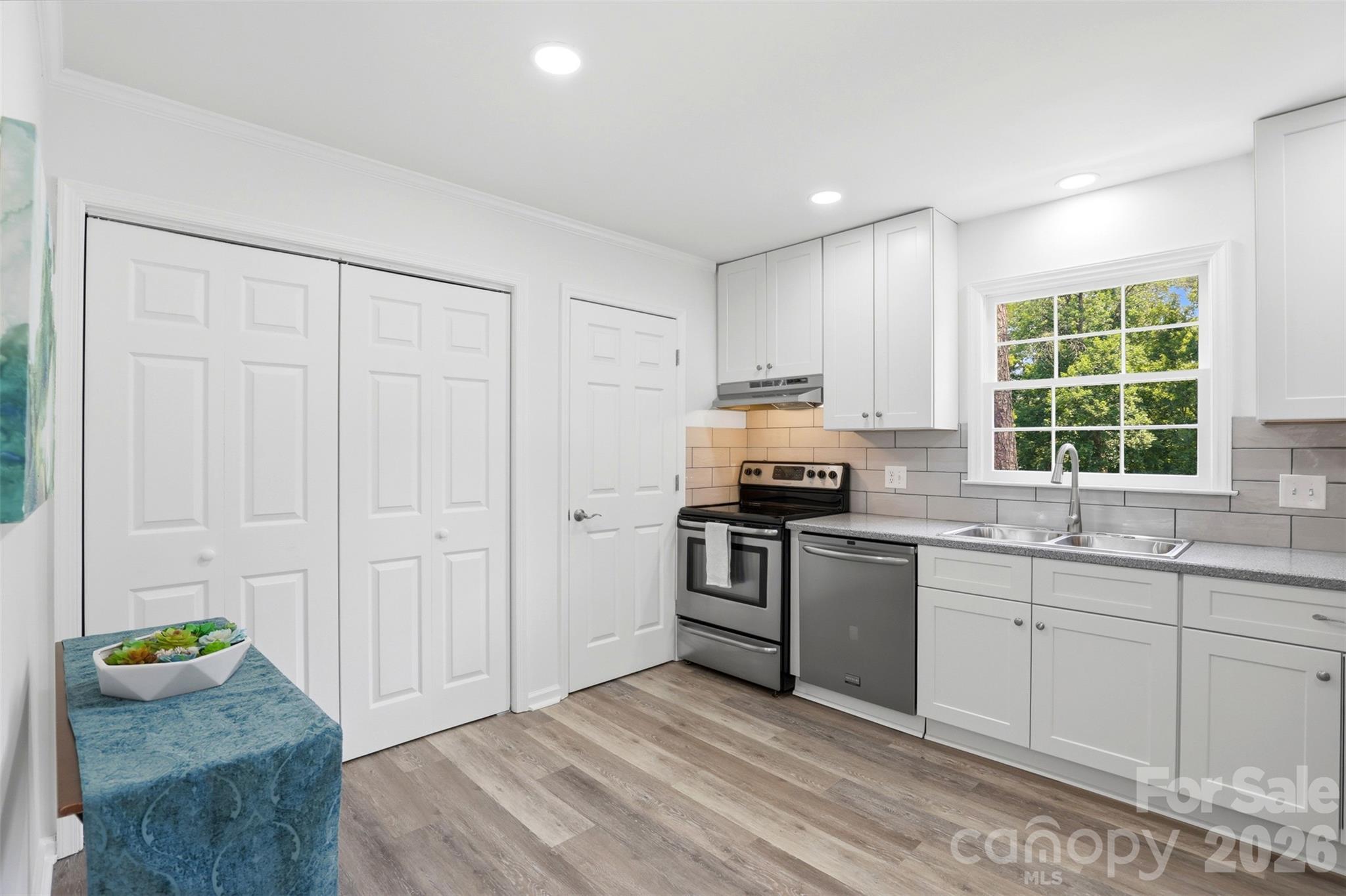 The laundry closet is conveniently located in this space, along with a nice pantry - 9624 Central Drive, Mint Hill