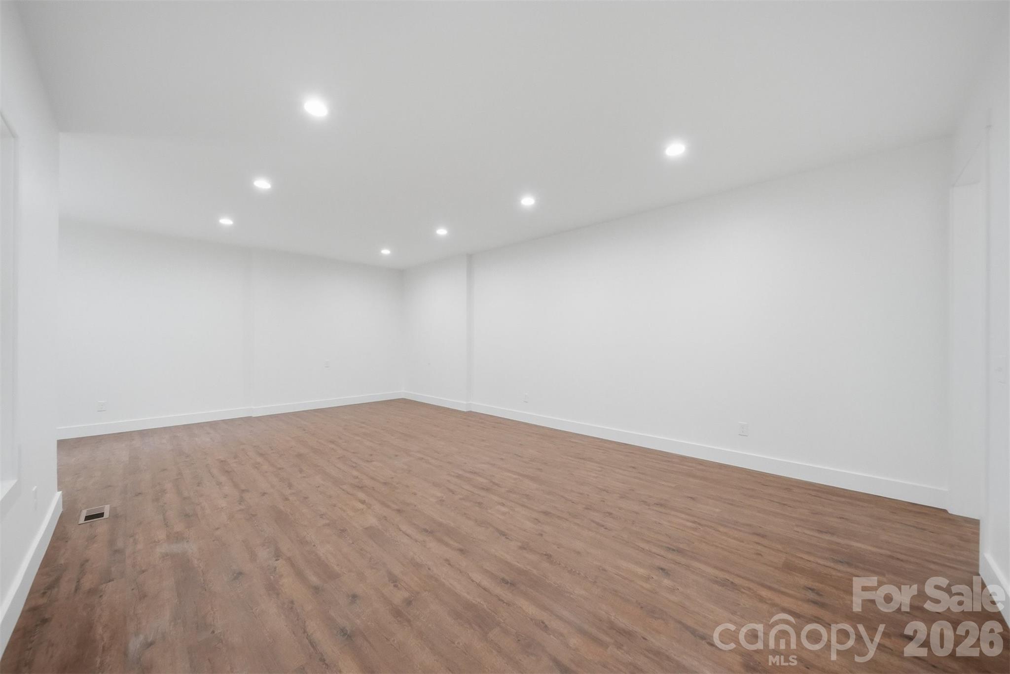 The finished basement has so much space. - 414 Scarlett Oak Court NE, Lenoir