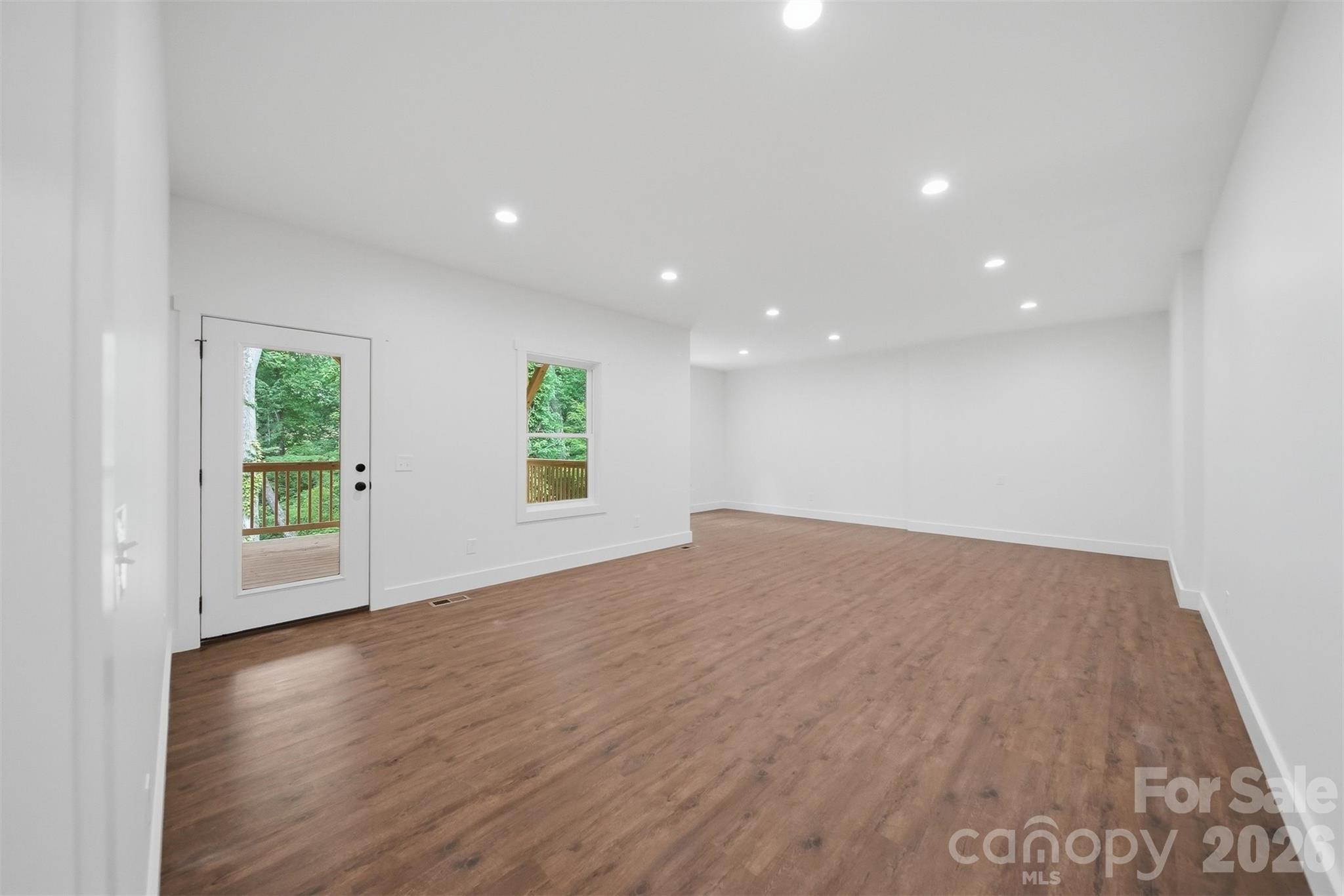 Large basement living space/recreation room. - 414 Scarlett Oak Court NE, Lenoir