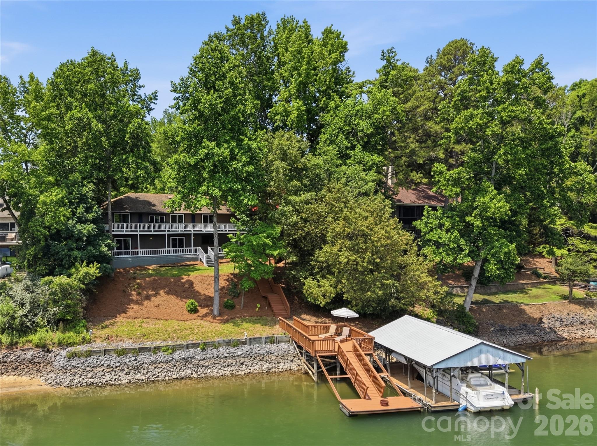 Stunningly renovated 4-bedroom, 4-bath waterfront home in sought-after Tega Cay with breathtaking Lake Wylie views - 1113 Palmyra Drive, Tega Cay