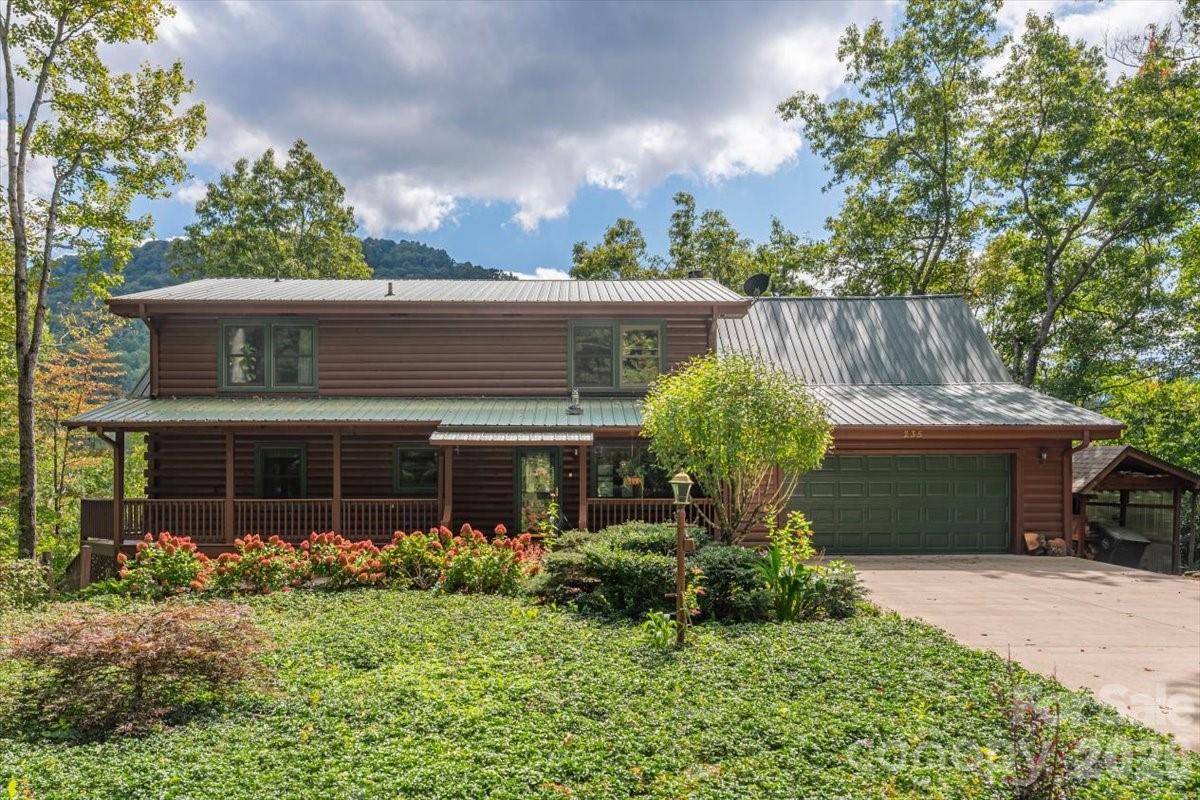Beautiful low maintenance landscaping. - 235 Timucua Trail, Waynesville