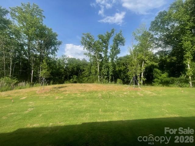 Enjoy views of nature from your back porch- Home backs up to nature preserve - 258 Alluvium Lane, Waxhaw