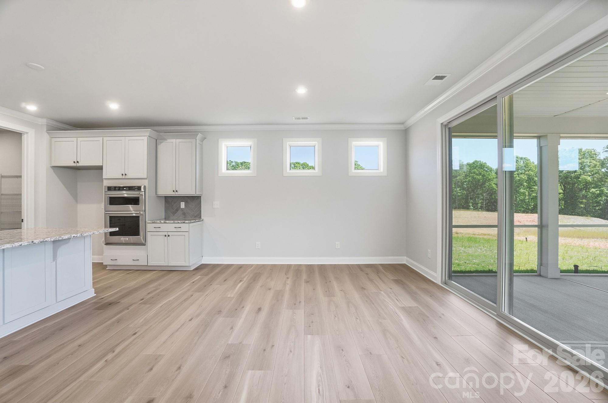Digital Image Similar--Dining Area can accommodate an 8-10 seat table. - 2517 Mabel Lane, Monroe